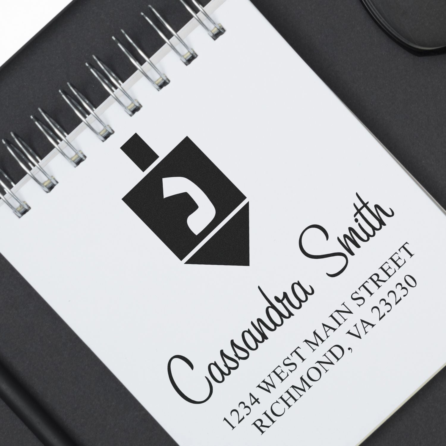 Custom return address rubber stamp for Cassondra Smith, Richmond VA, ideal for envelopes, mailings, and business use.