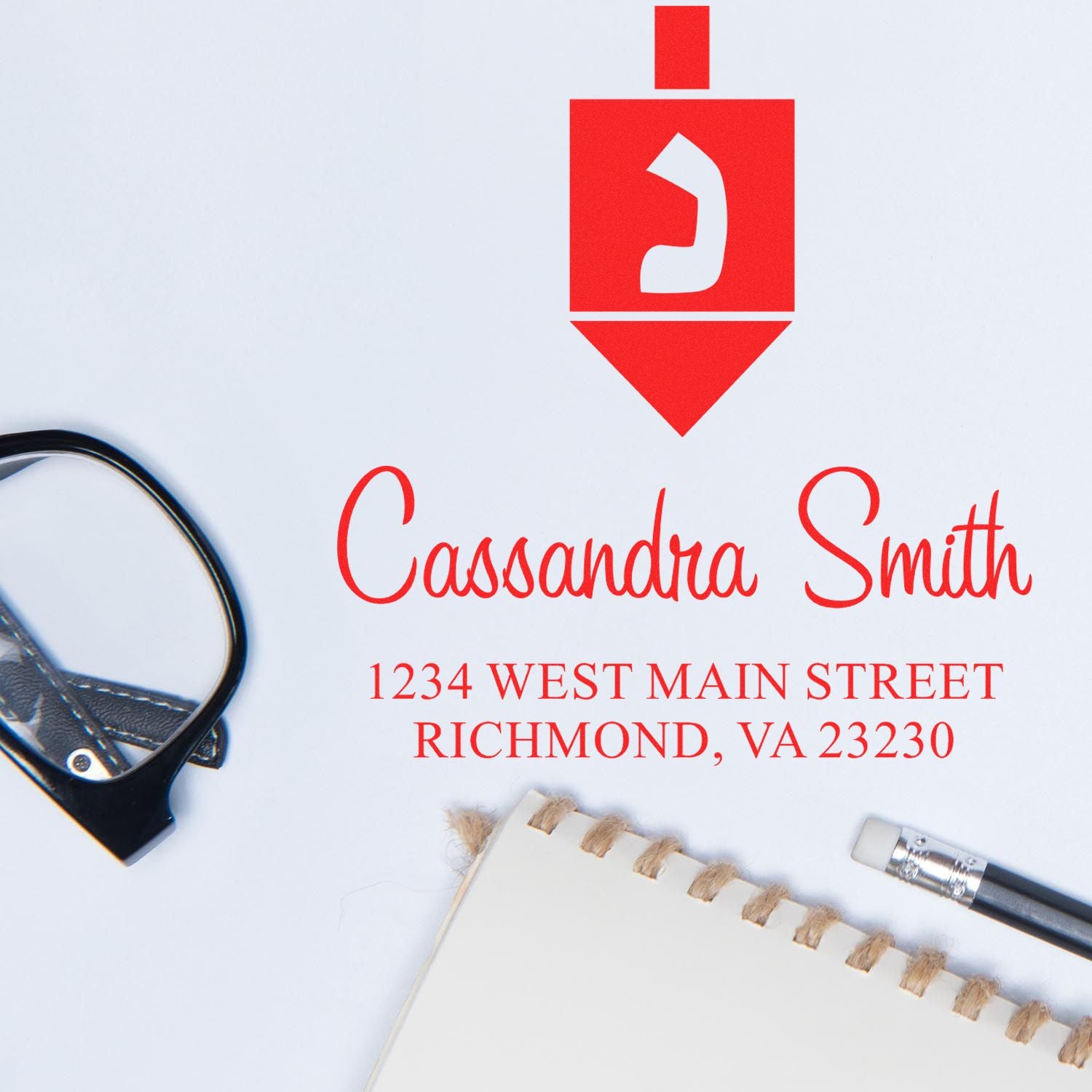 Custom name and address rubber stamp for Cassandra Smith, with logo and Richmond, VA mailing address for stationery and business mail.
