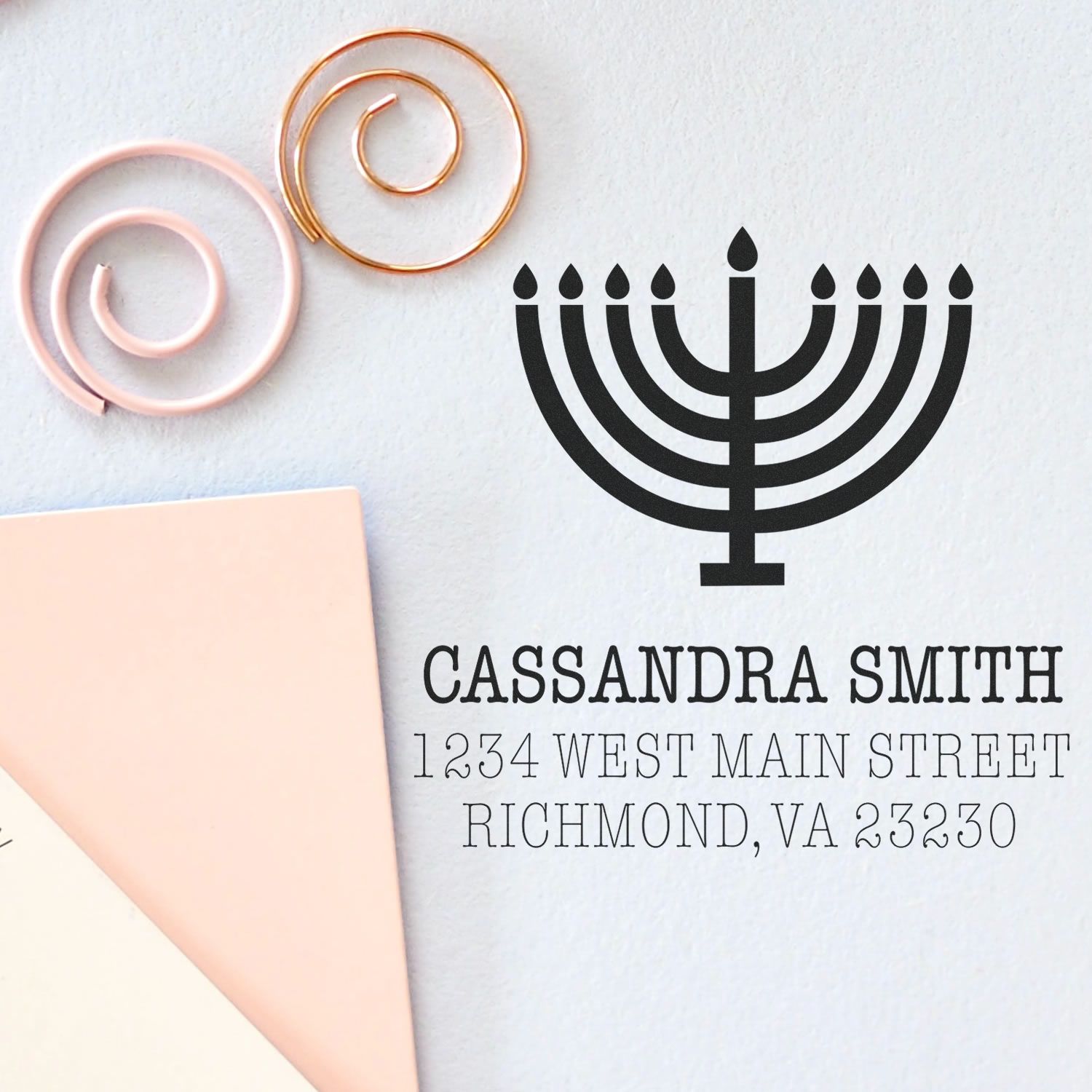 Personalized return address rubber stamp with menorah design, featuring Cassandra Smith and Richmond, VA address.