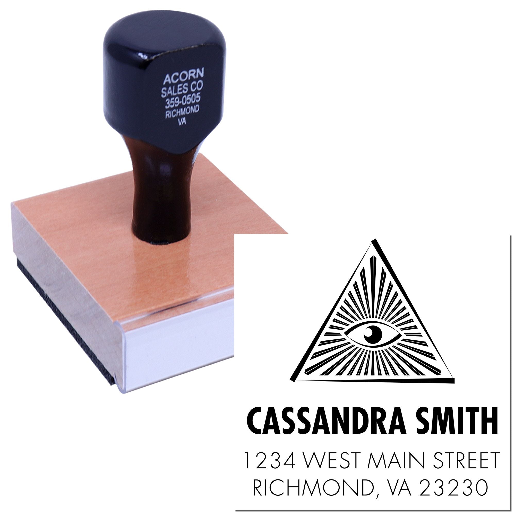 Custom rubber stamp for Cassandra Smith with eye logo and address, shown beside a sample stamped impression.