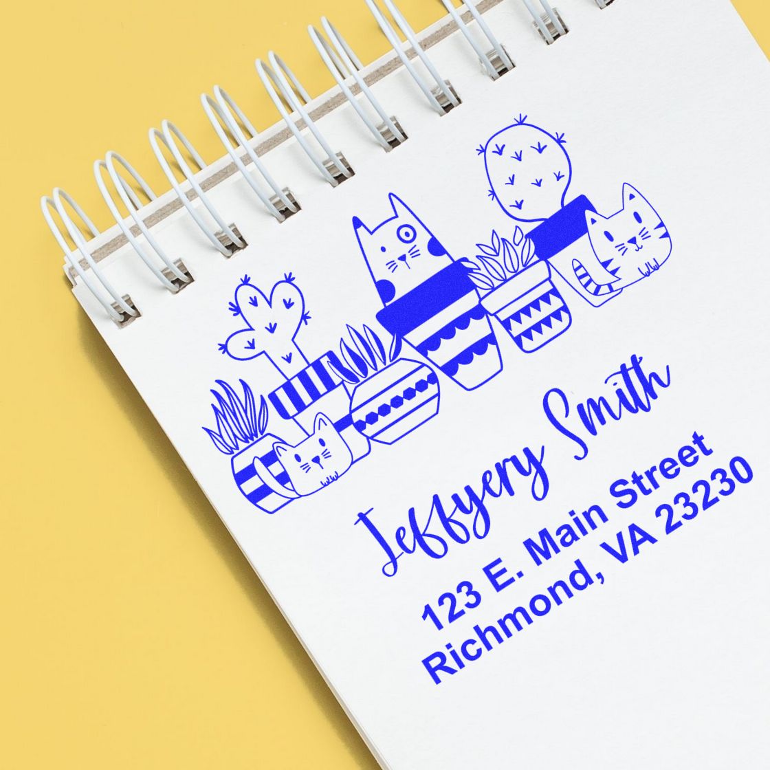 Custom rubber stamp design with cats and potted cacti, featuring Jeffrey Smith name and Richmond, VA address.