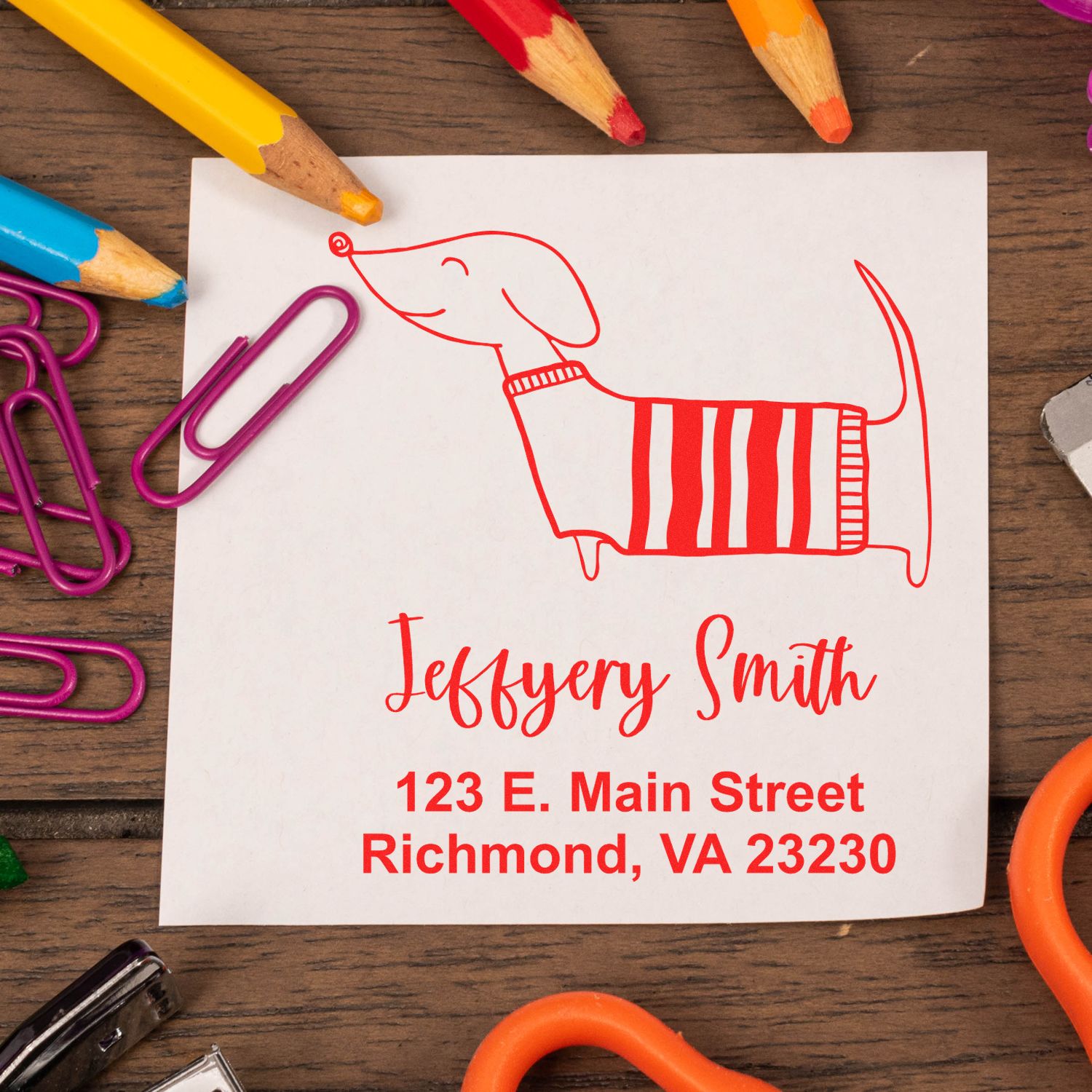 Personalized dog return address rubber stamp impression with name and address, perfect for pet-themed mail and stationery.