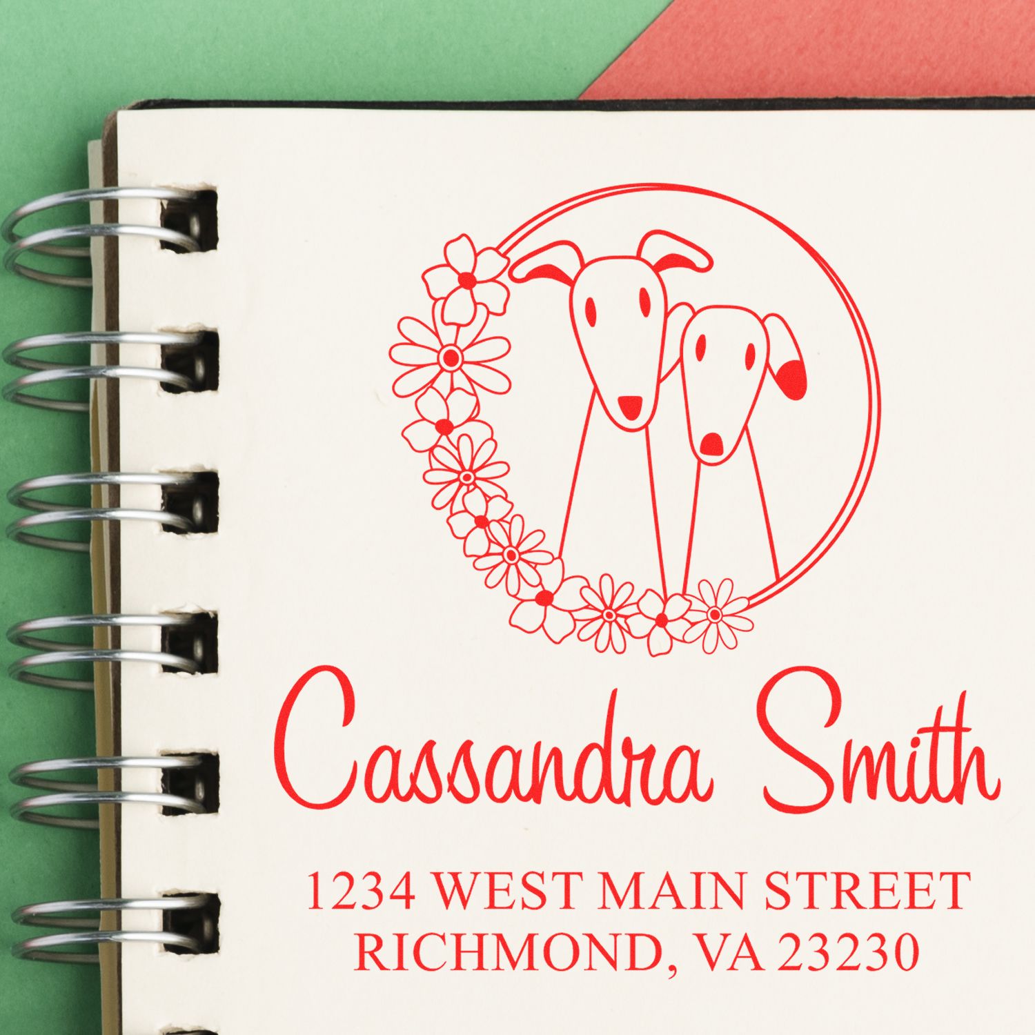 Personalized rubber address stamp with floral dog monogram for Cassandra Smith, showing name and mailing address.