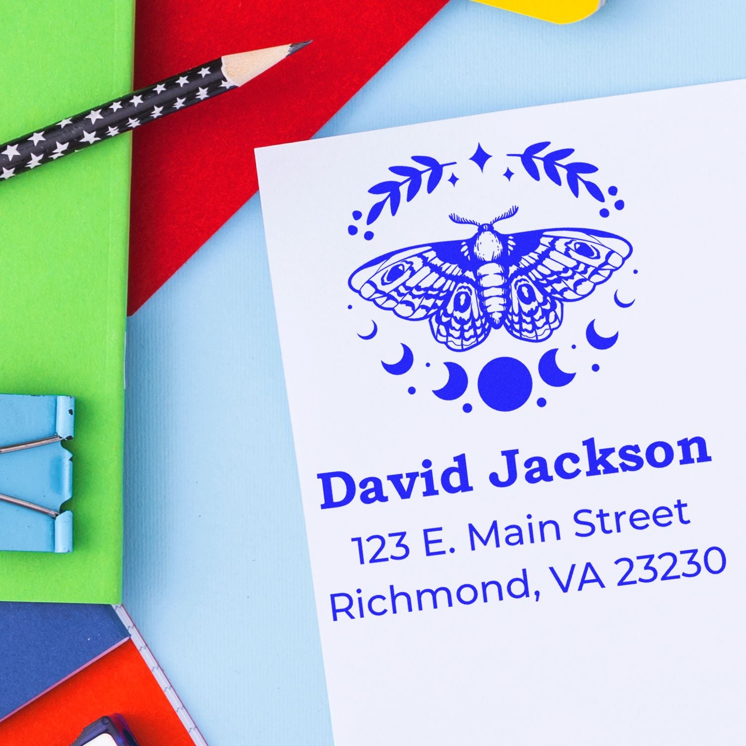 Personalized address rubber stamp with moth design and David Jackson return address in Richmond, VA.