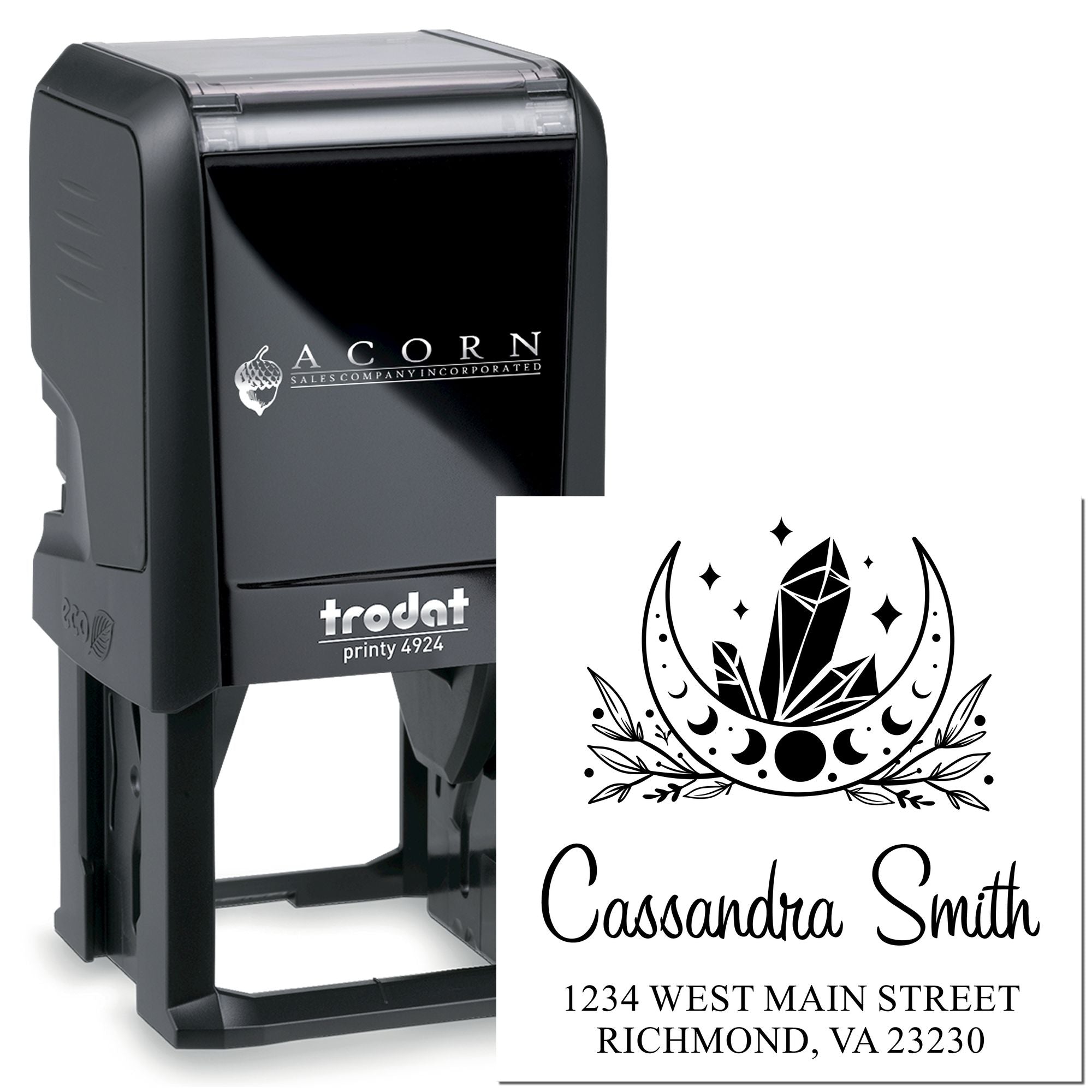 Black Trodat Printy 4924 self-inking rubber stamp with custom return address and crystal moon logo.