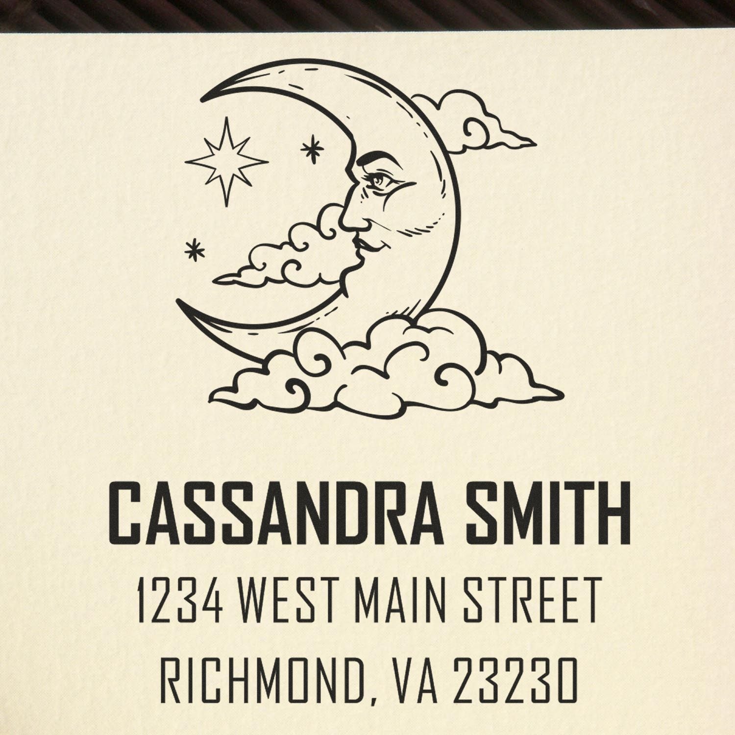 Custom return address rubber stamp with crescent moon design, Cassandra Smith, 1234 West Main Street, Richmond, VA 23230.