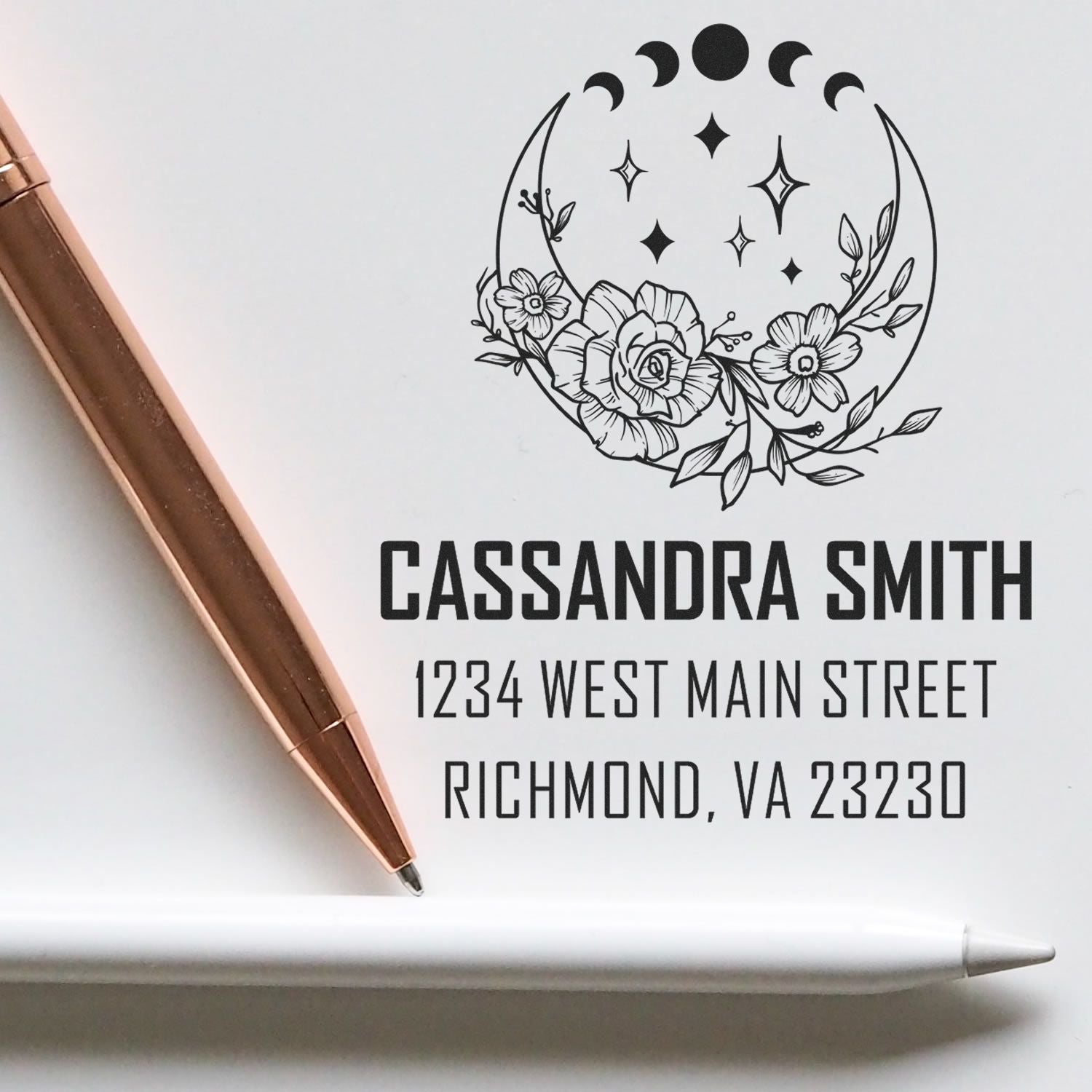 Custom floral moon return address rubber stamp for Cassandra Smith, Richmond VA, with pen and stamped design preview.