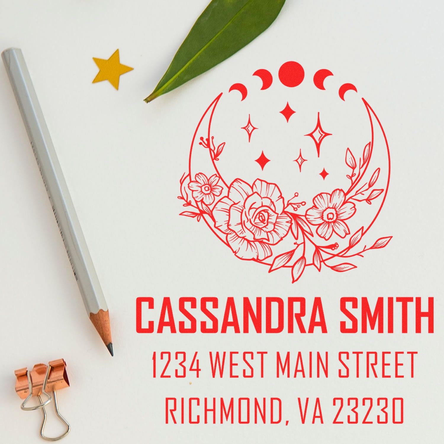 Personalized return address rubber stamp with floral moon design, name, and address for envelopes.