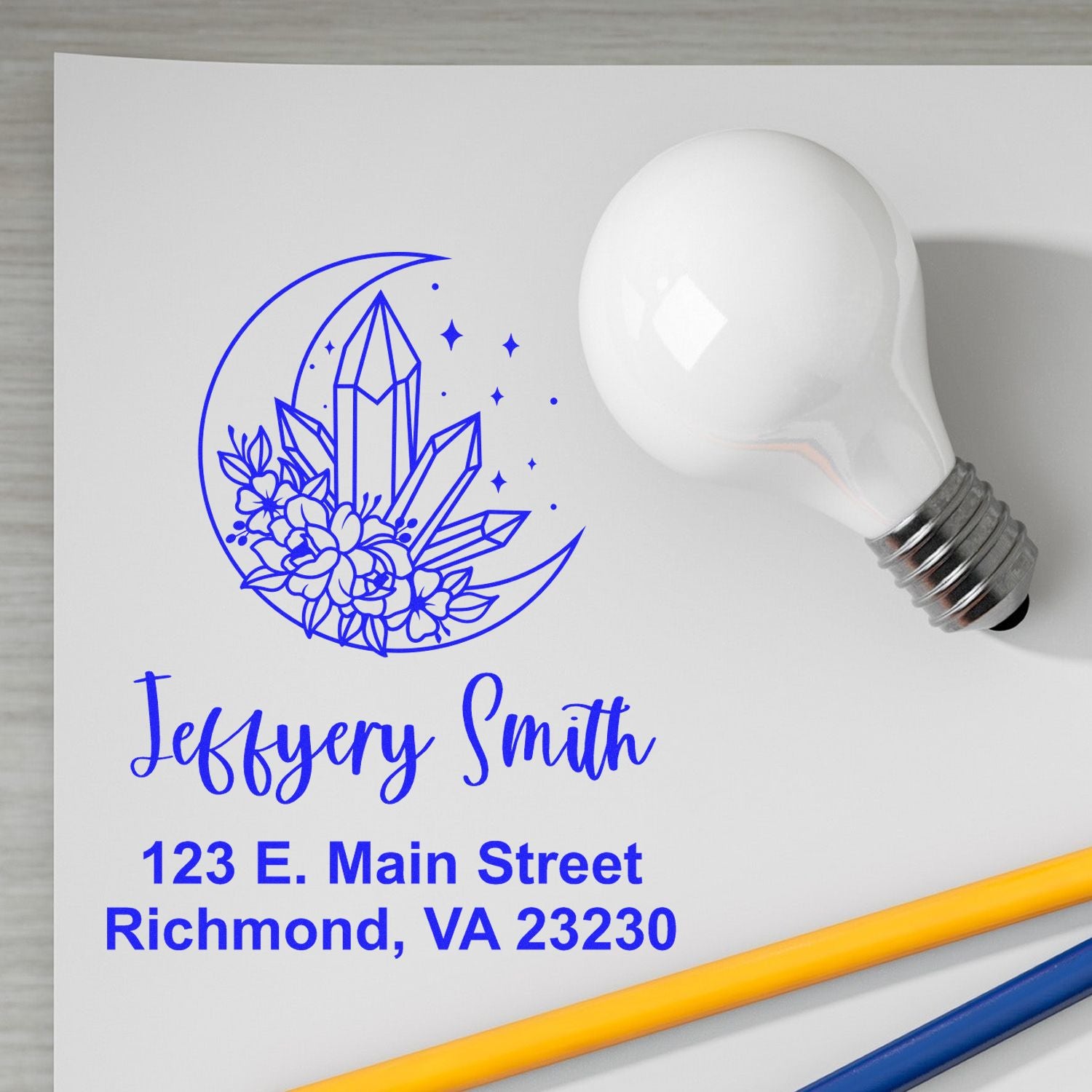 Custom rubber stamp design with crystal moon floral logo, Jeffrey Smith name, and Richmond, VA address for business use.