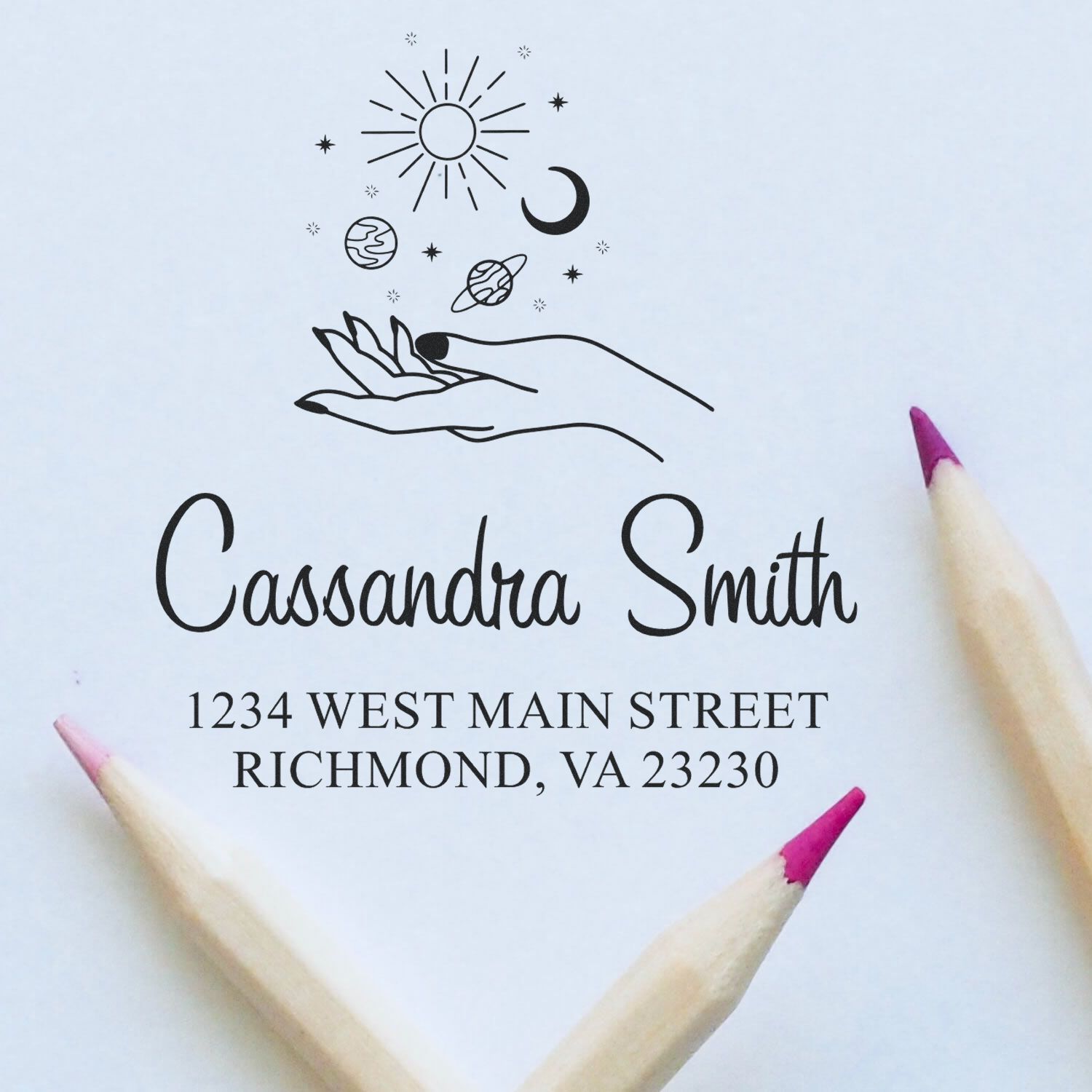 Custom return address rubber stamp with celestial hand design, personalized for Cassandra Smith, Richmond, VA.
