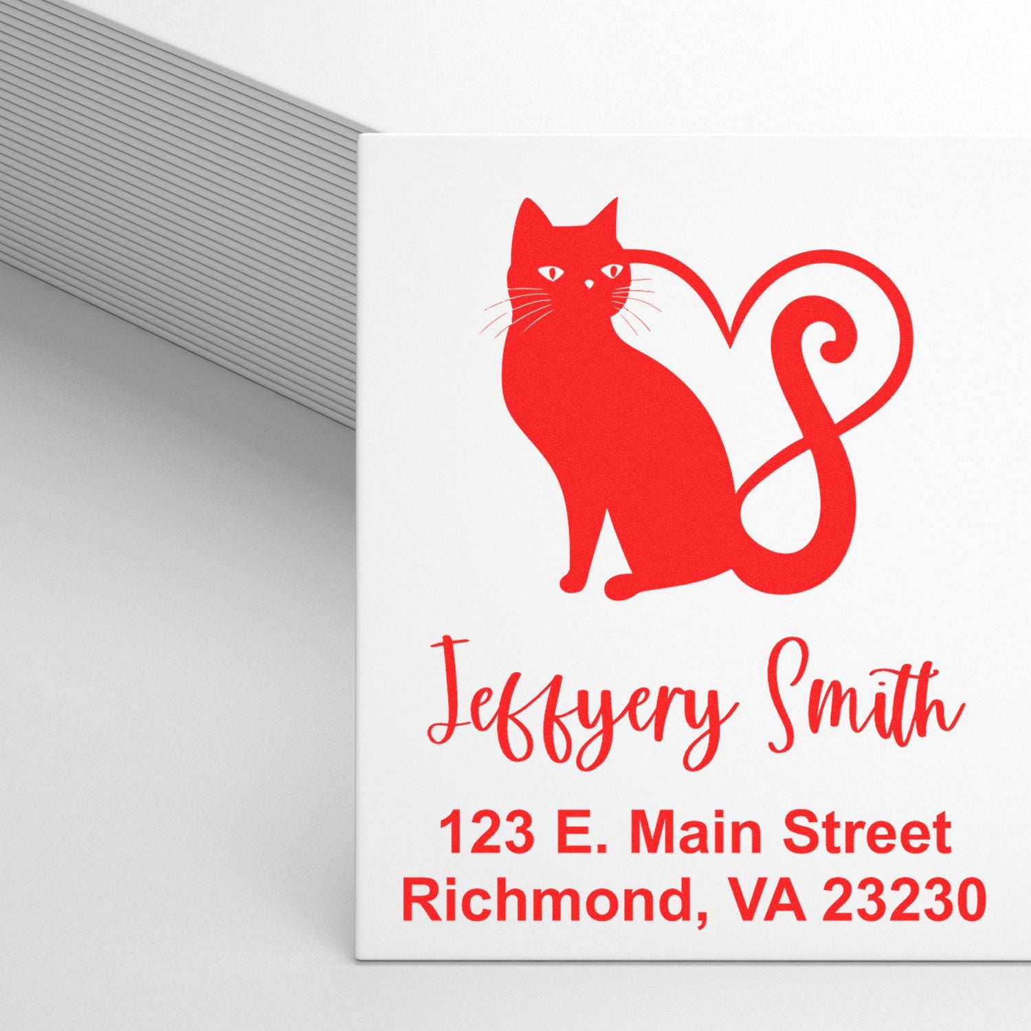 Custom cat return address rubber stamp with name and Richmond, VA address for personalized mailing.