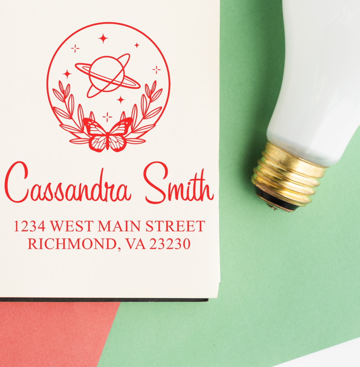 Personalized return address rubber stamp with celestial butterfly design and sample imprint for Cassandra Smith
