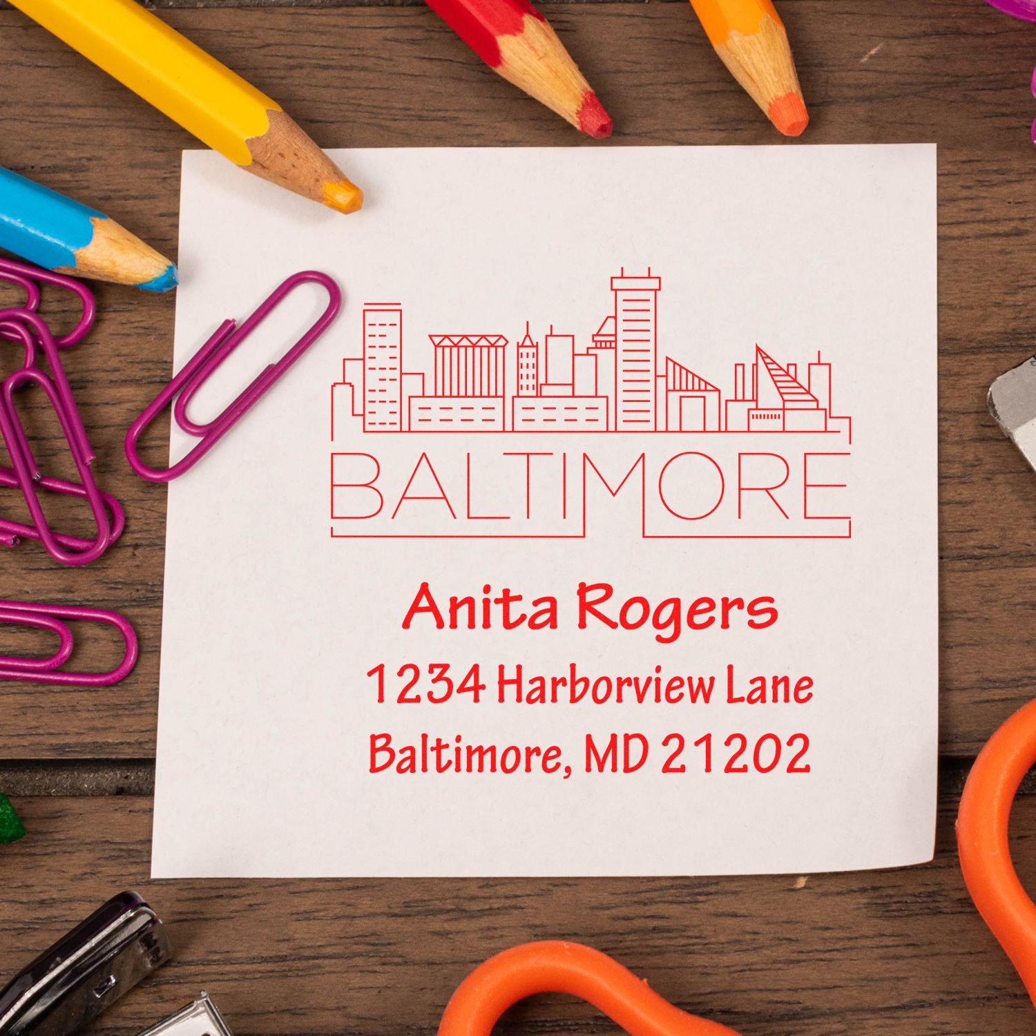 Custom Baltimore skyline address rubber stamp with personalized name and mailing address for envelopes and stationery.