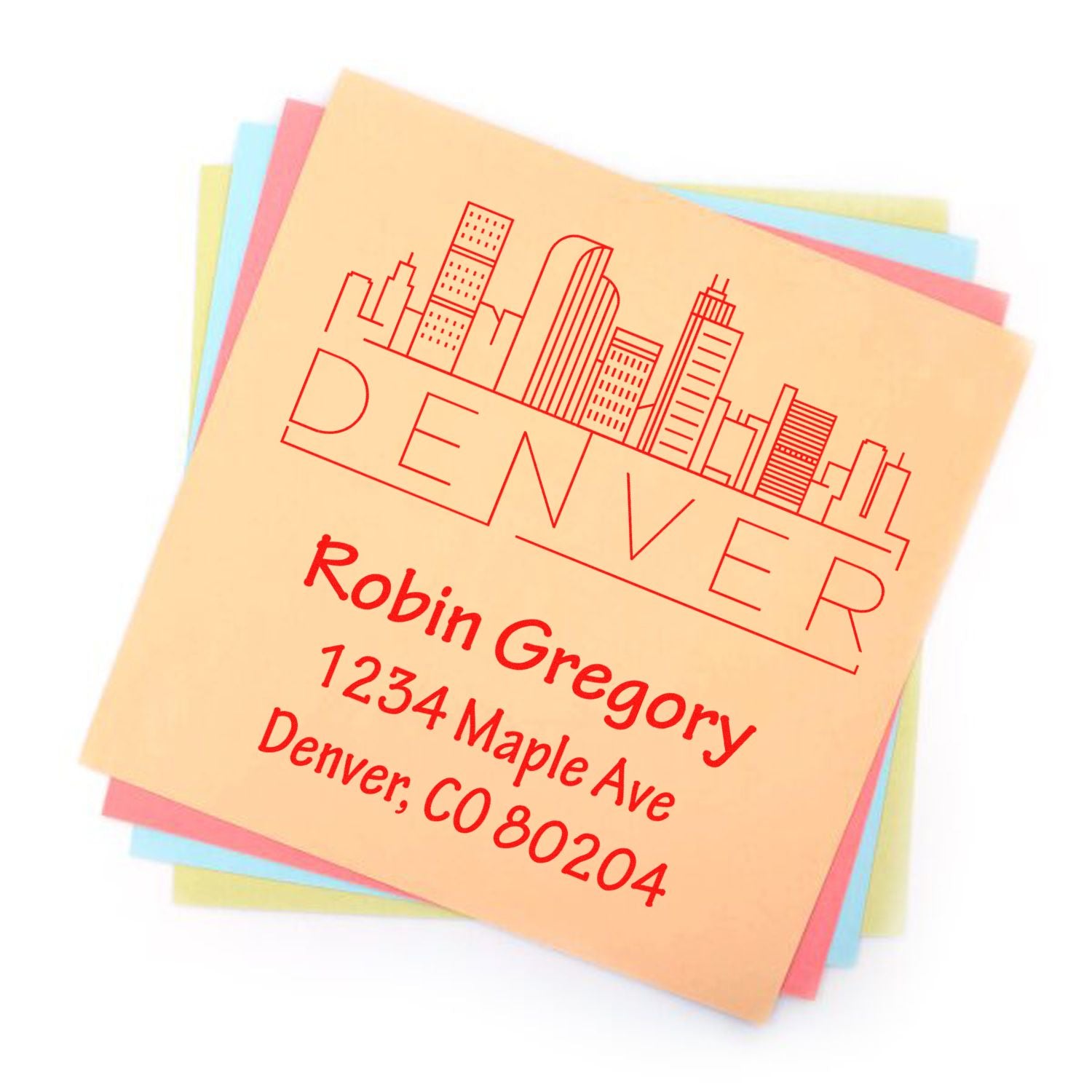 Custom Denver address rubber stamp with skyline design for return mail and business envelopes.