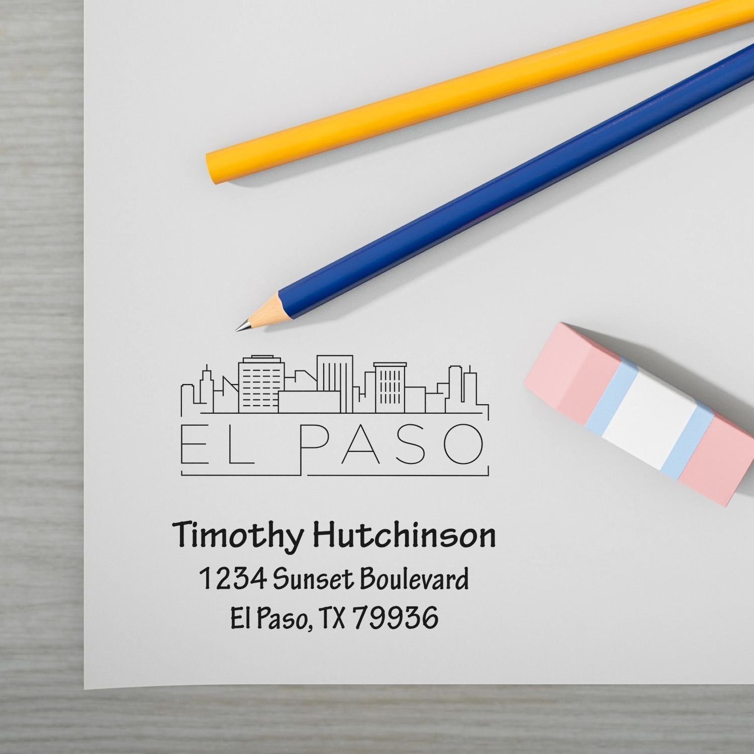 Custom El Paso return address rubber stamp with skyline logo, Timothy Hutchinson name, and Texas mailing address.