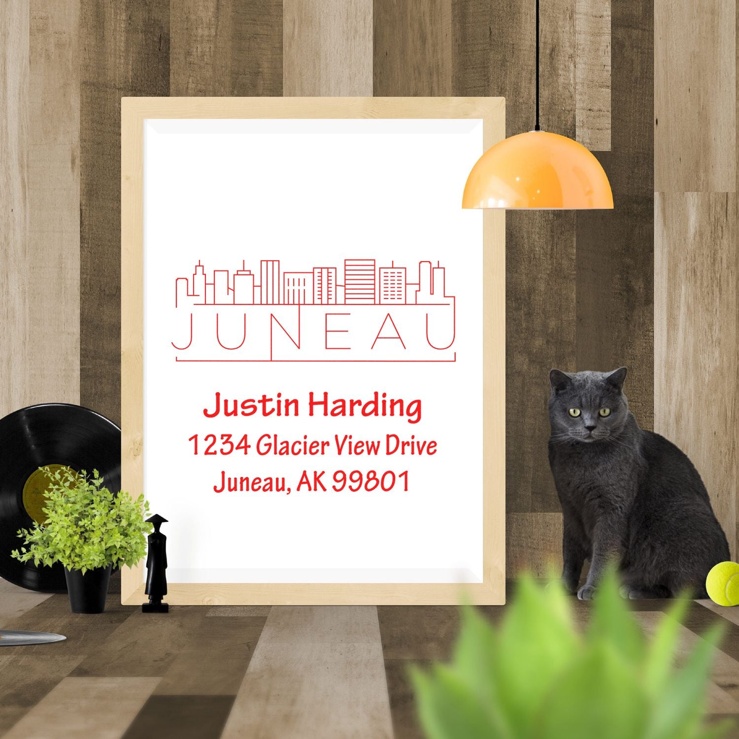 Custom address rubber stamp with Juneau skyline for Justin Harding, 1234 Glacier View Drive, Juneau, AK 99801.