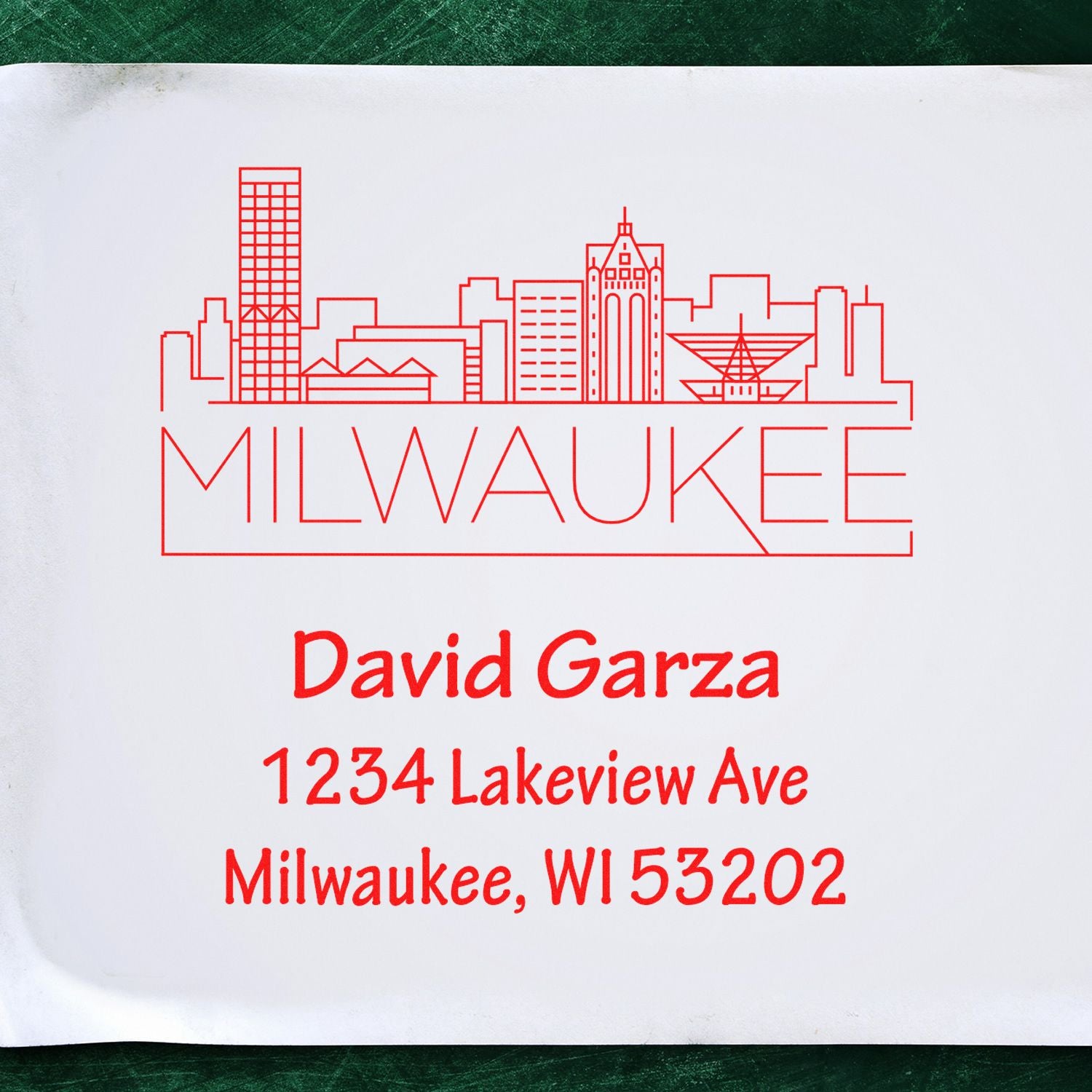 Custom Milwaukee address rubber stamp with skyline, David Garza, 1234 Lakeview Ave, Milwaukee, WI 53202.
