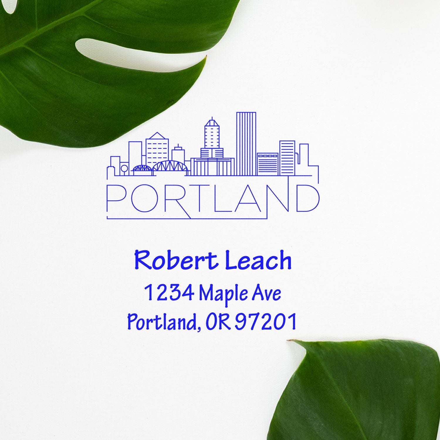 Custom rubber stamp with Portland skyline and address for Robert Leach, 1234 Maple Ave, Portland, OR 97201