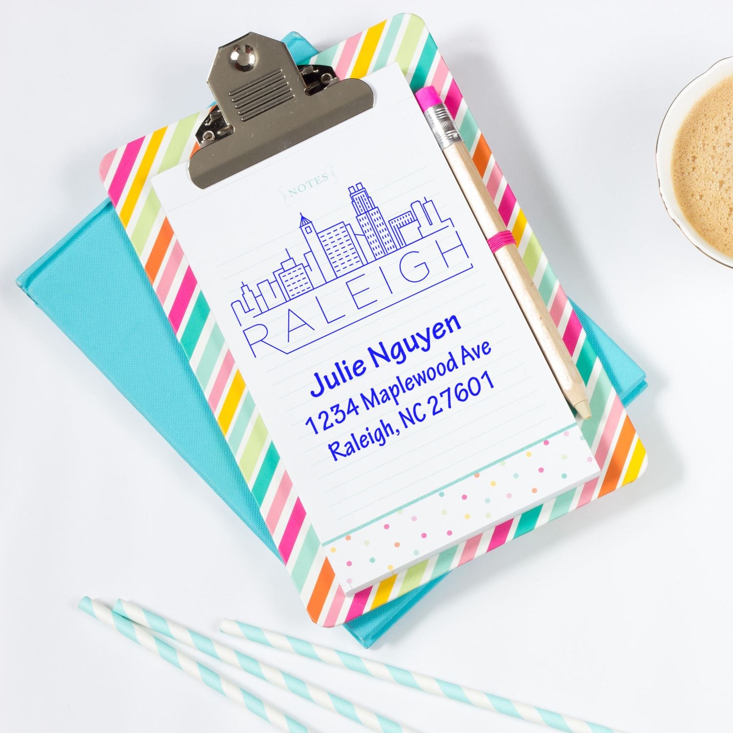 Custom address rubber stamp with Raleigh skyline, perfect for personalized stationery, mailing, and small business branding.