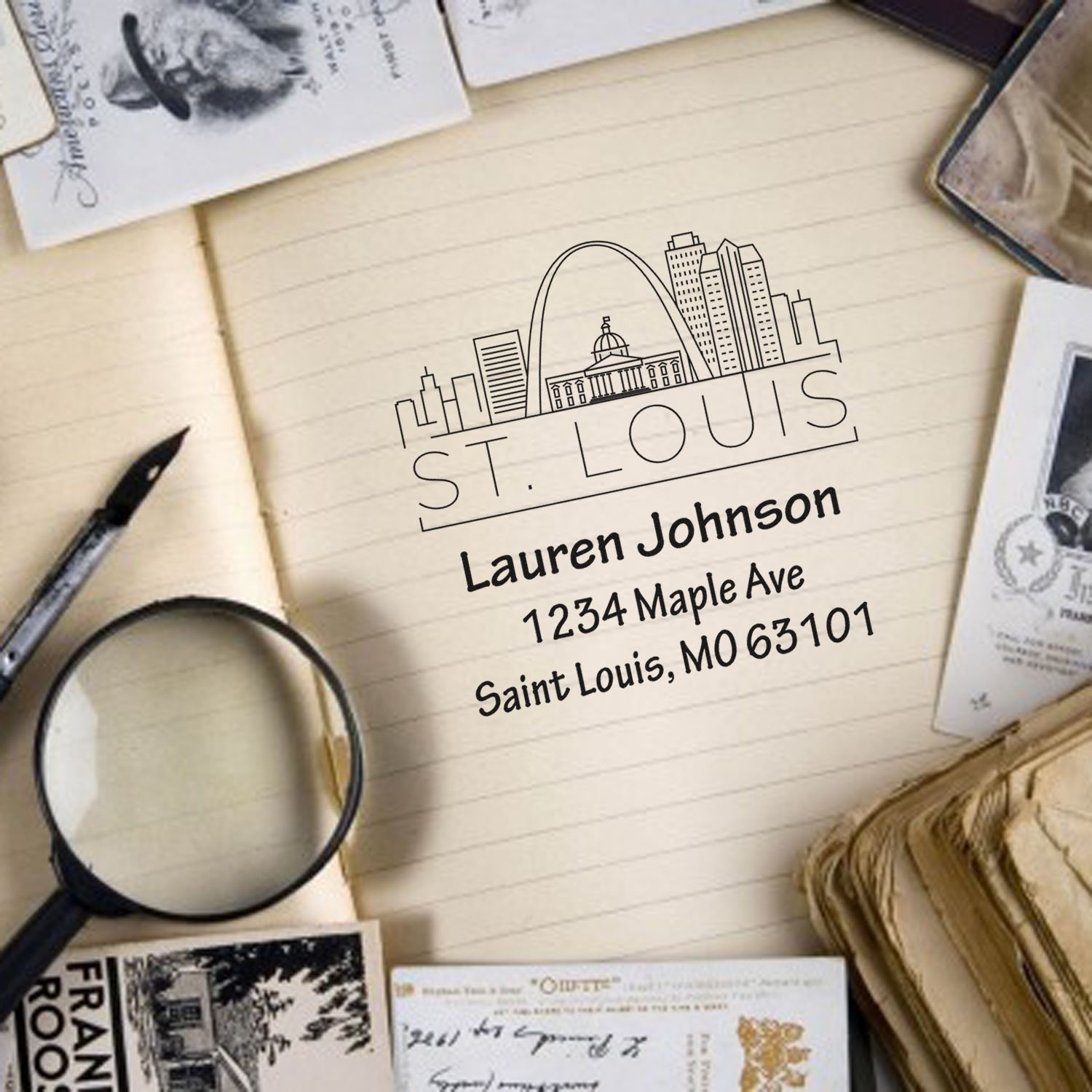Personalized St. Louis address rubber stamp with skyline design, name, and mailing address for envelopes and stationery.