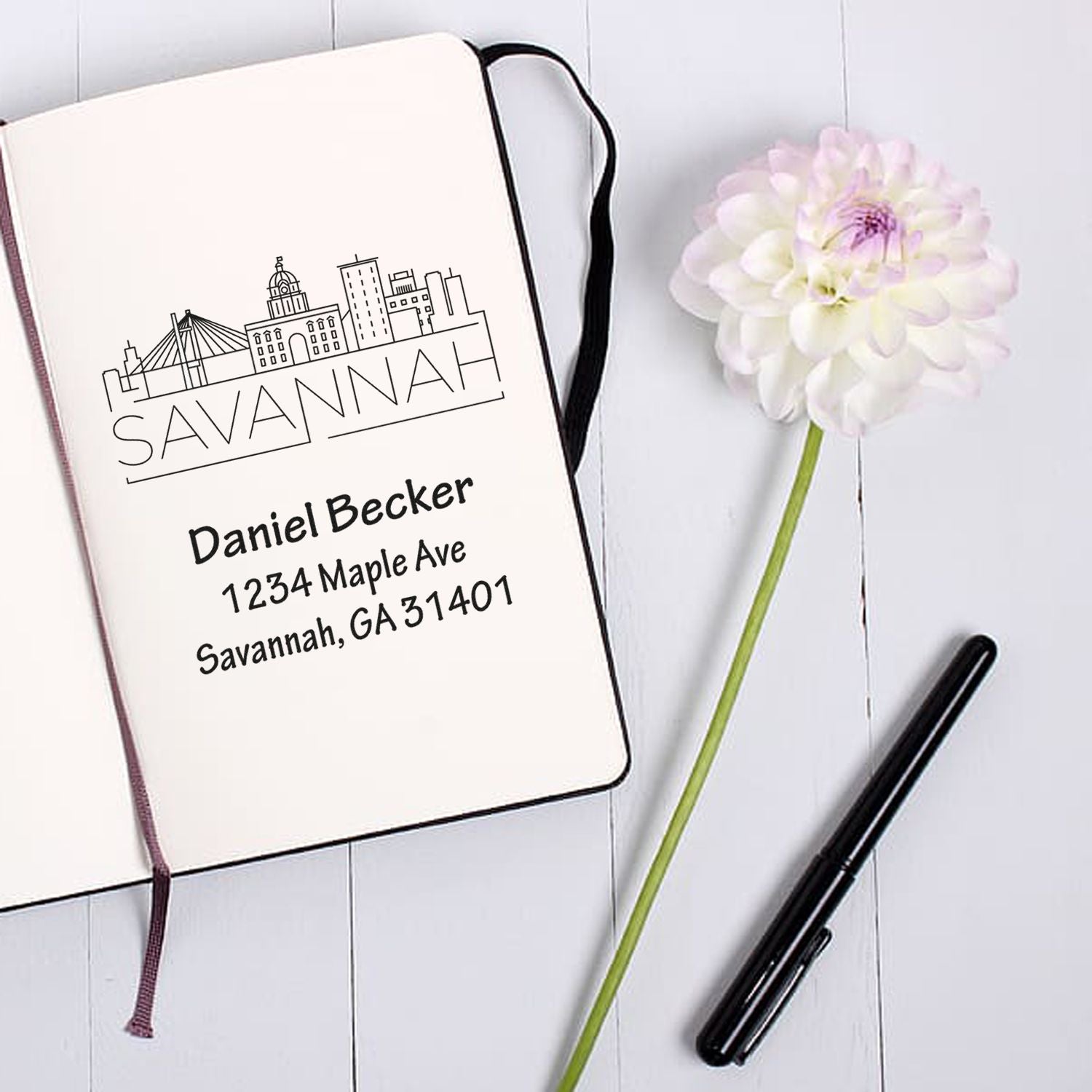 Custom Savannah address rubber stamp with skyline design, personalized with Daniel Becker name and Georgia mailing address.