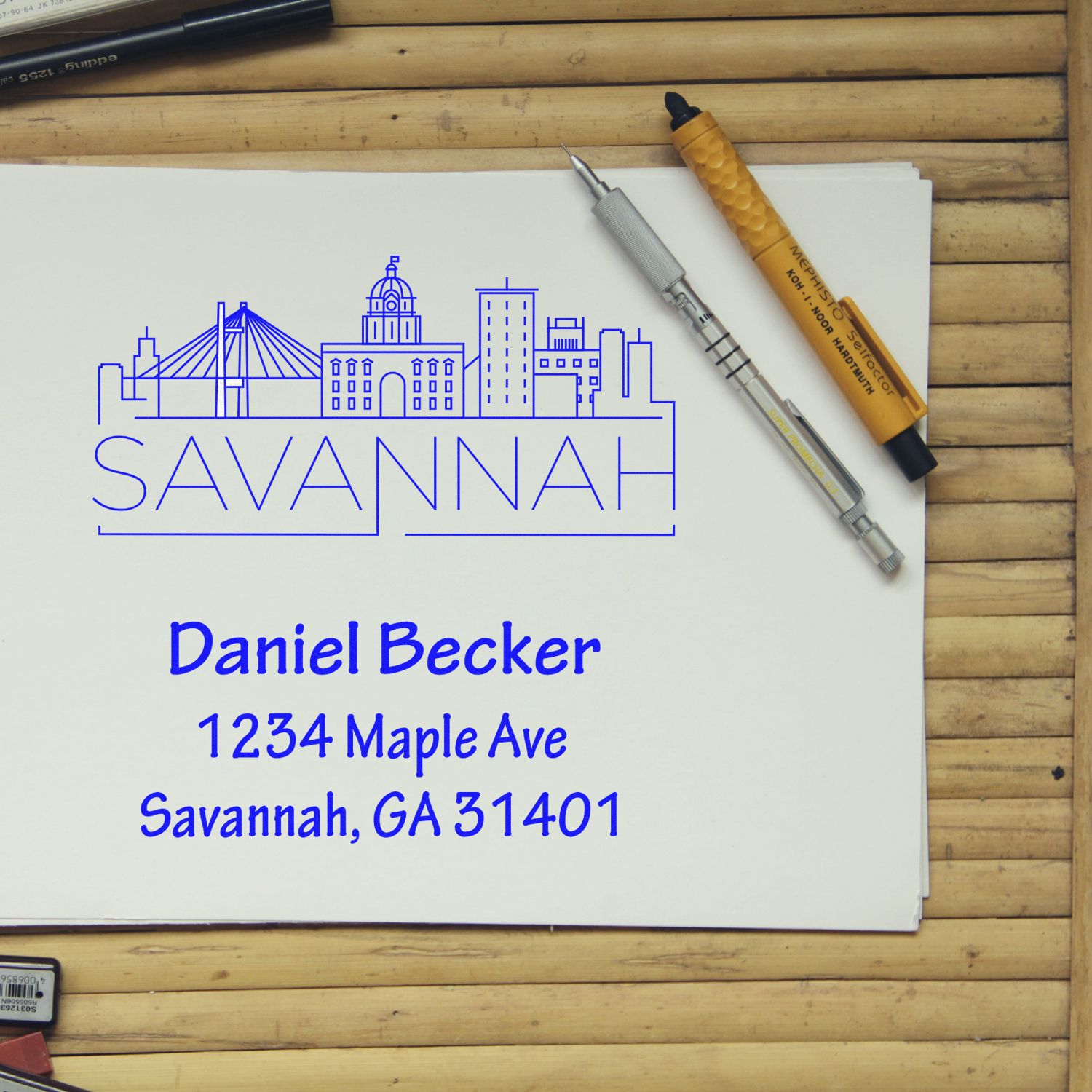 Custom rubber stamp design for Savannah address labels: Daniel Becker, 1234 Maple Ave, Savannah, GA 31401.