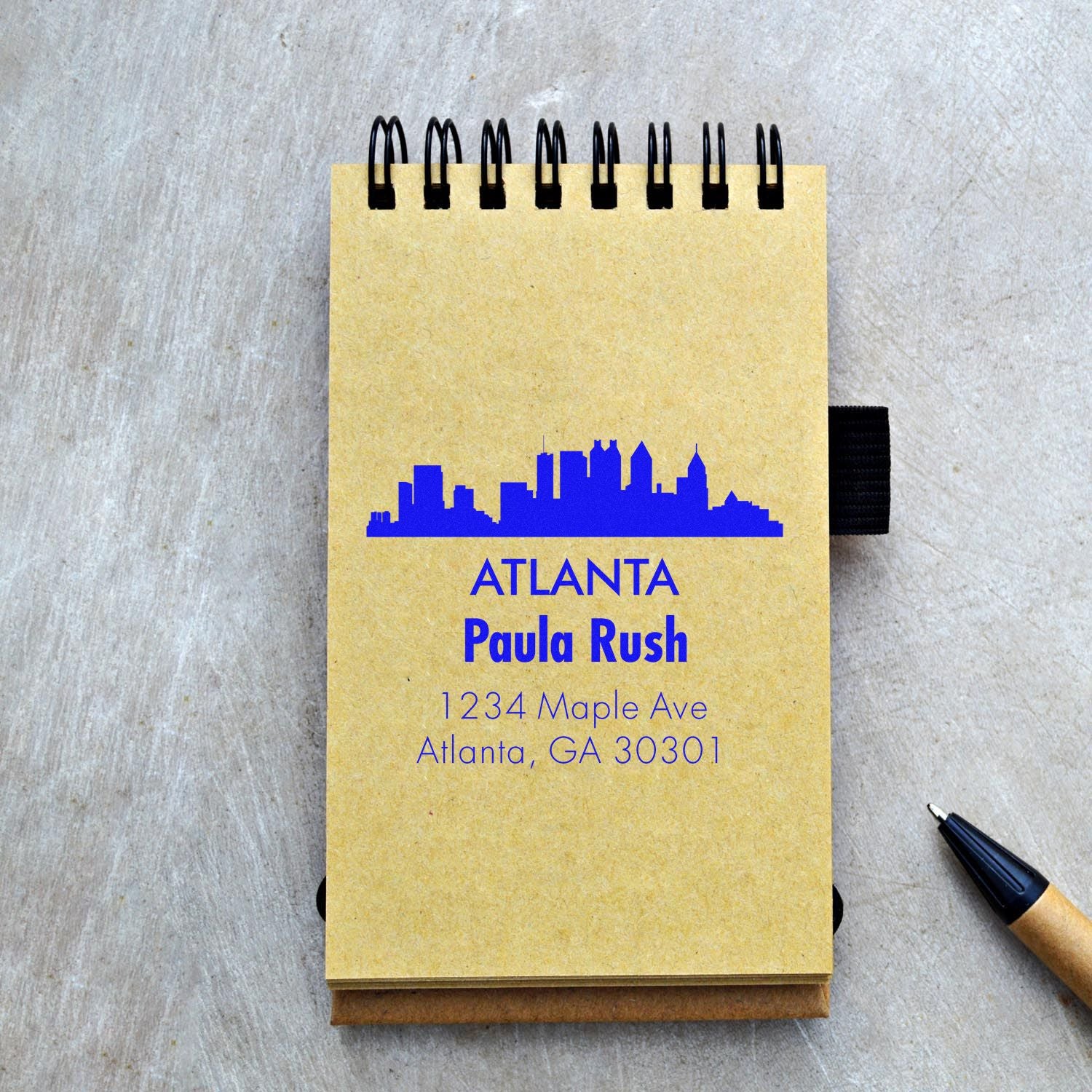 Atlanta return address rubber stamp design with skyline, name, and street address.