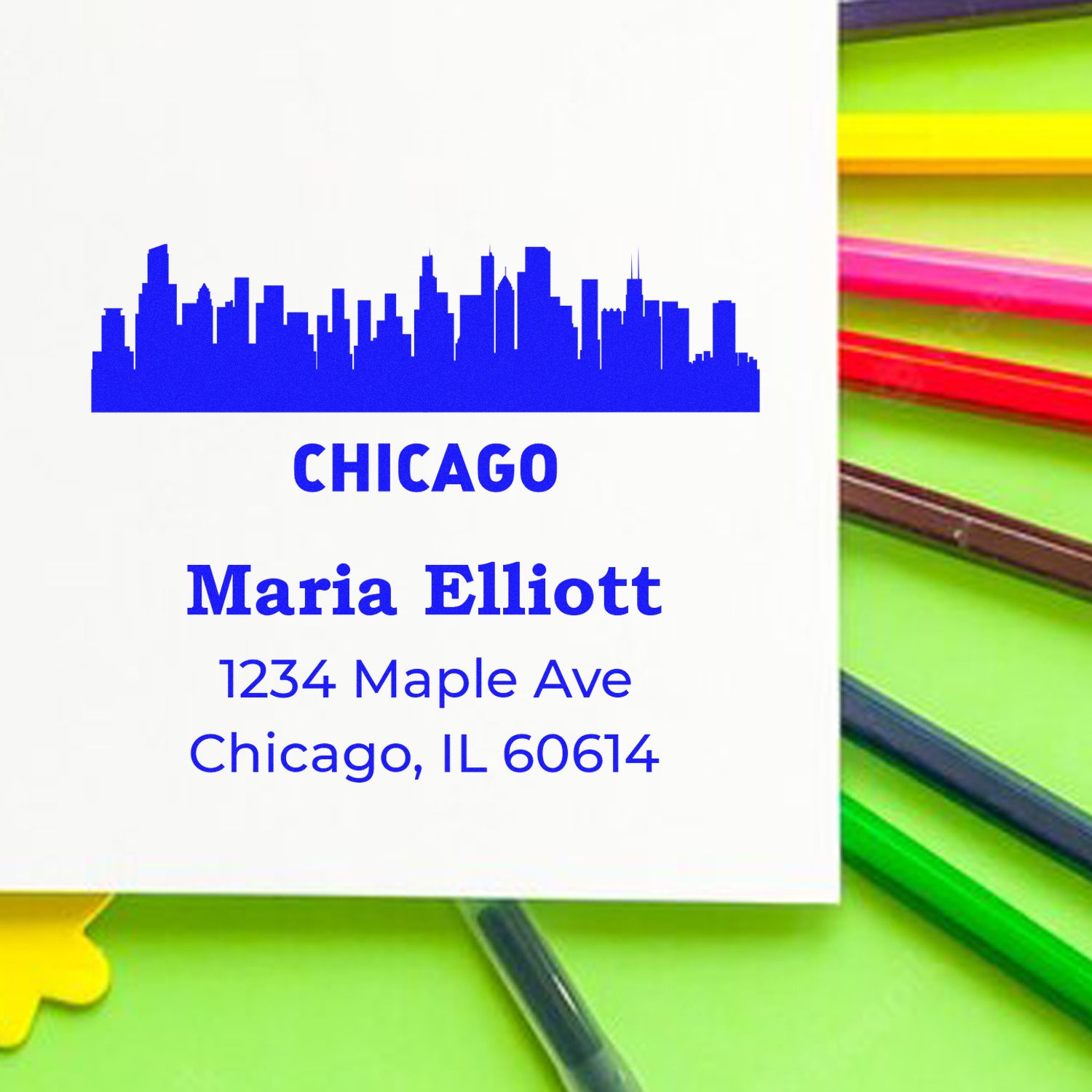Custom Chicago skyline return address rubber stamp with Maria Elliott name and address for personalized mailing.