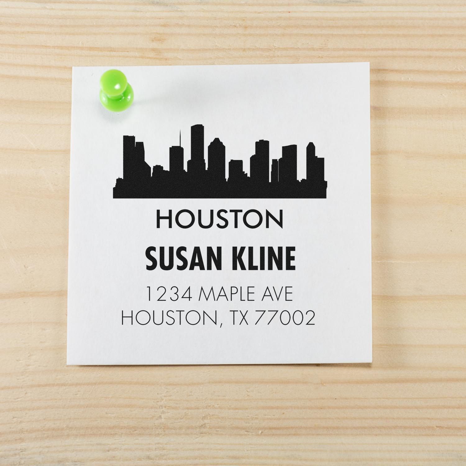 Custom Houston skyline return address rubber stamp for Susan Kline, 1234 Maple Ave, Houston, TX 77002.