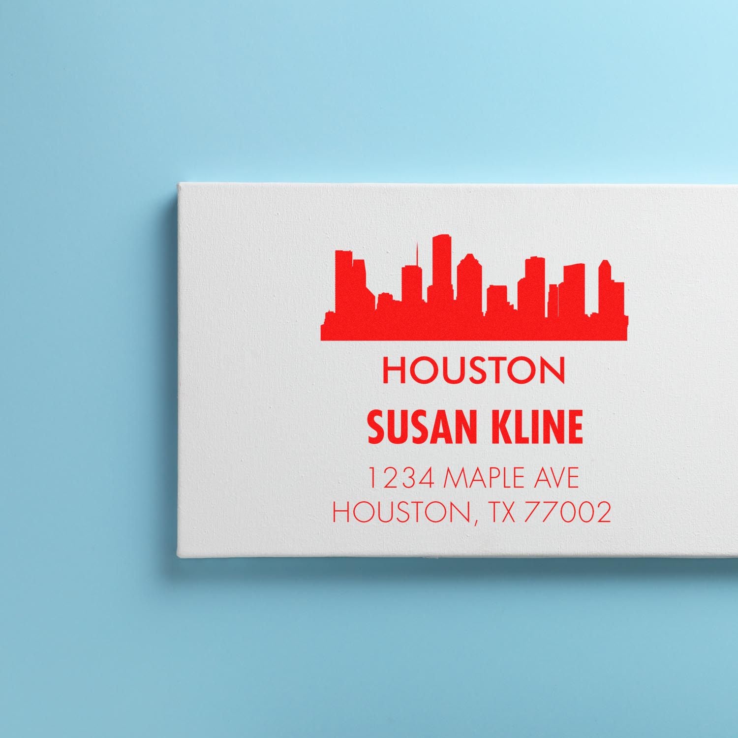 Custom Houston skyline return address rubber stamp for Susan Kline, 1234 Maple Ave, Houston, TX 77002.