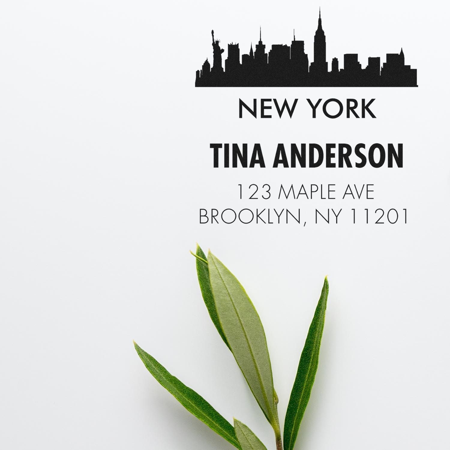 Custom New York rubber address stamp for envelopes, with skyline silhouette, name, and Brooklyn return address.
