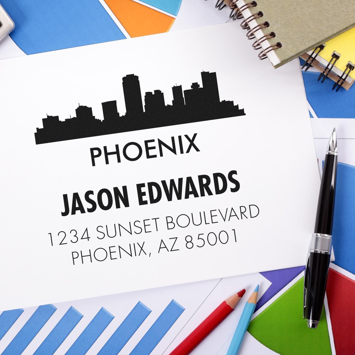 Custom rubber address stamp with Phoenix skyline, Jason Edwards name, and return address for personalized mailing.