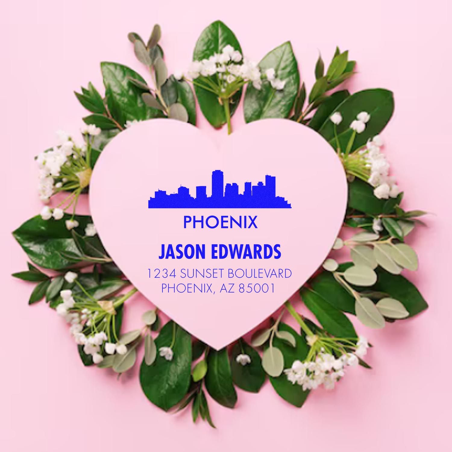 Custom return address rubber stamp mockup with Phoenix skyline, Jason Edwards name, and floral heart wreath.
