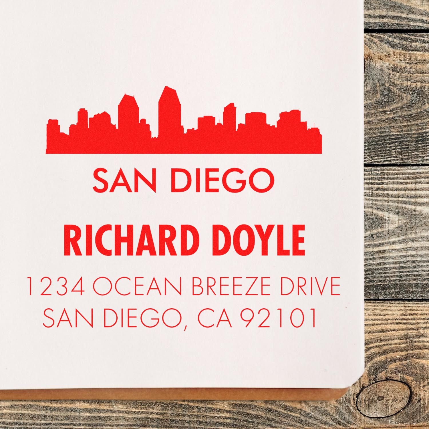 Custom San Diego address rubber stamp with skyline, Richard Doyle, and Ocean Breeze Drive mailing address.