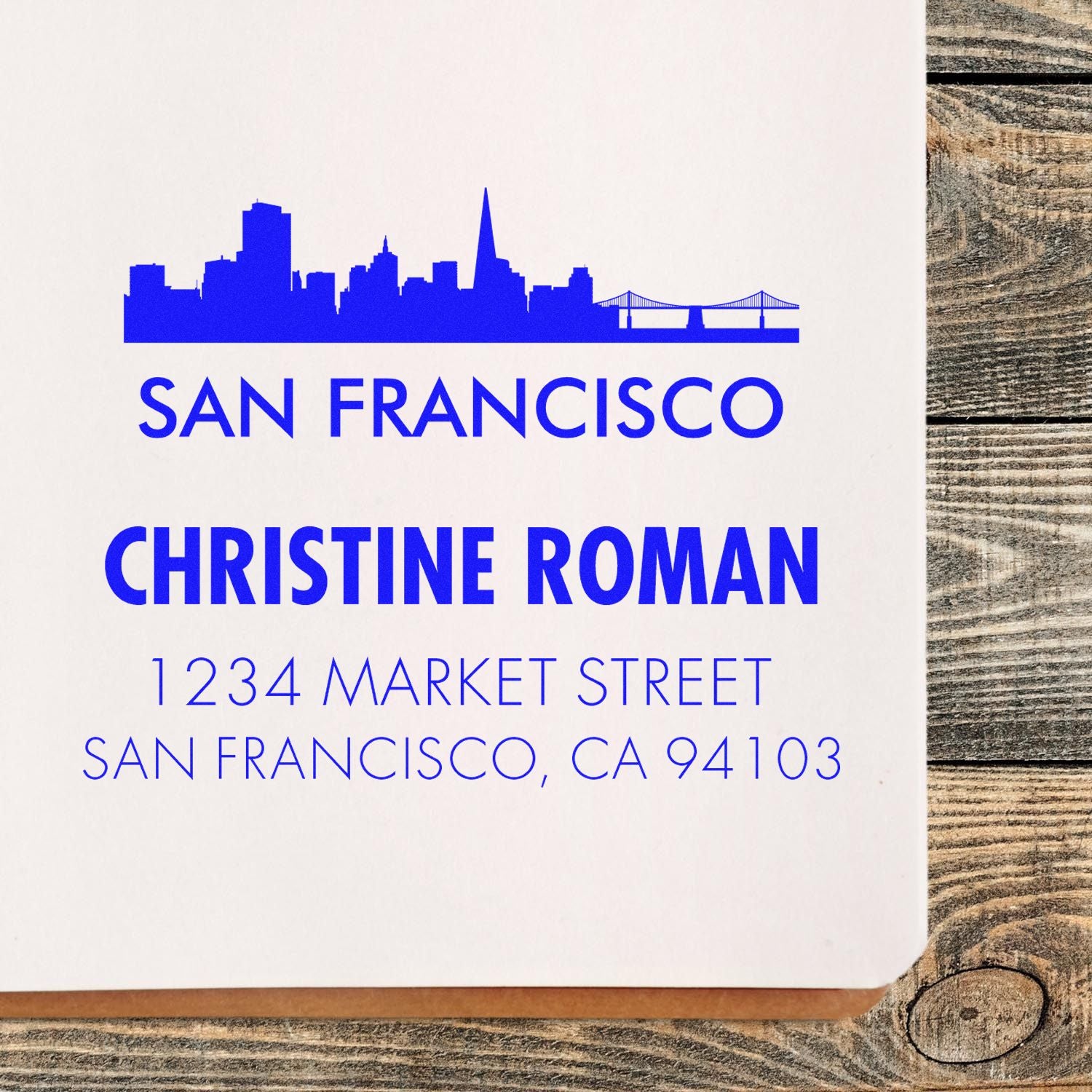 Personalized San Francisco address rubber stamp with skyline, Christine Roman name, and Market Street mailing address.