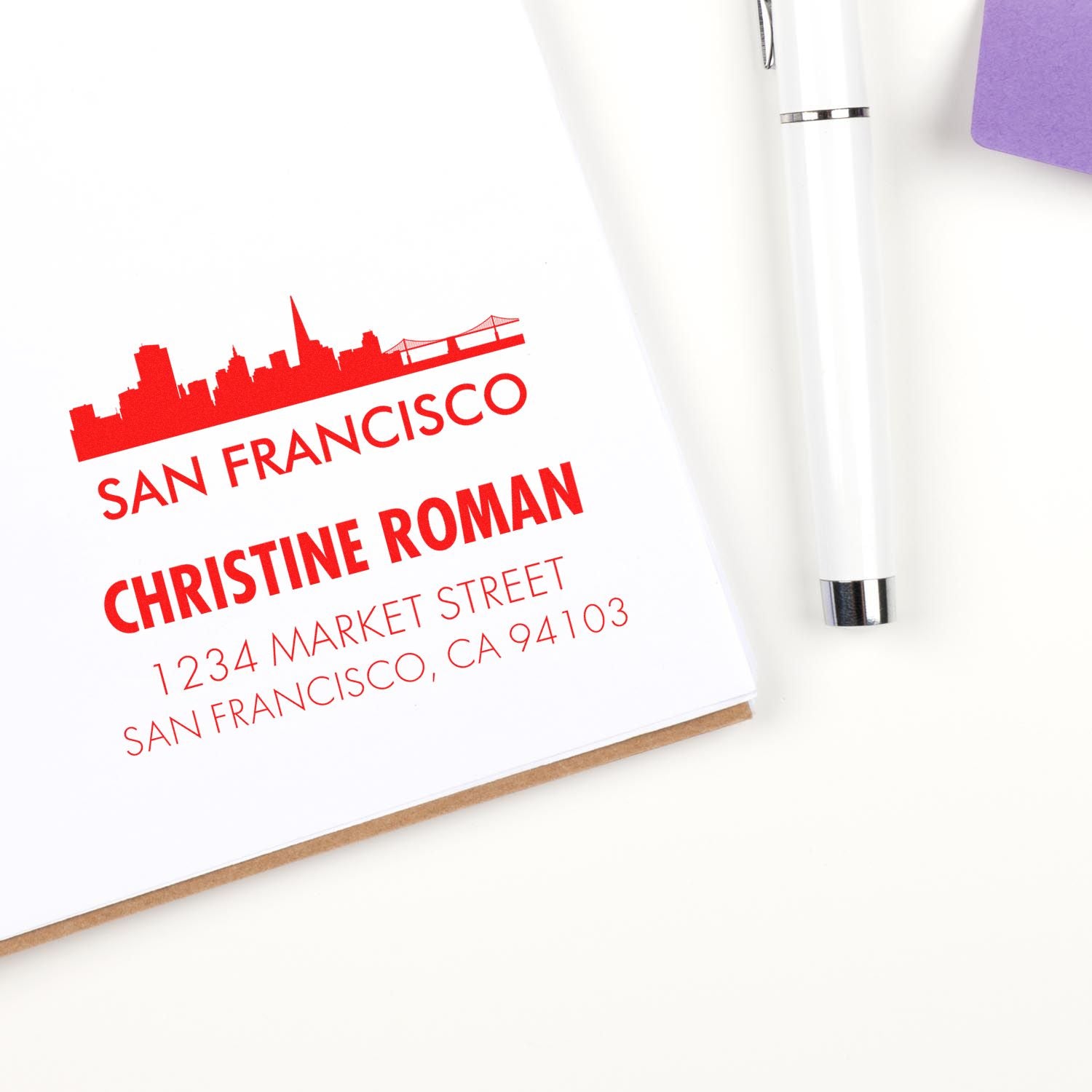 Custom San Francisco address rubber stamp with skyline logo, personalized name and address for stationery and mail.