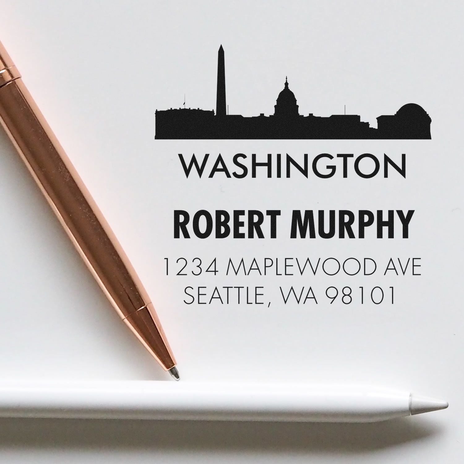 Custom Washington address rubber stamp with Seattle skyline, personalized name and address for mailing envelopes.