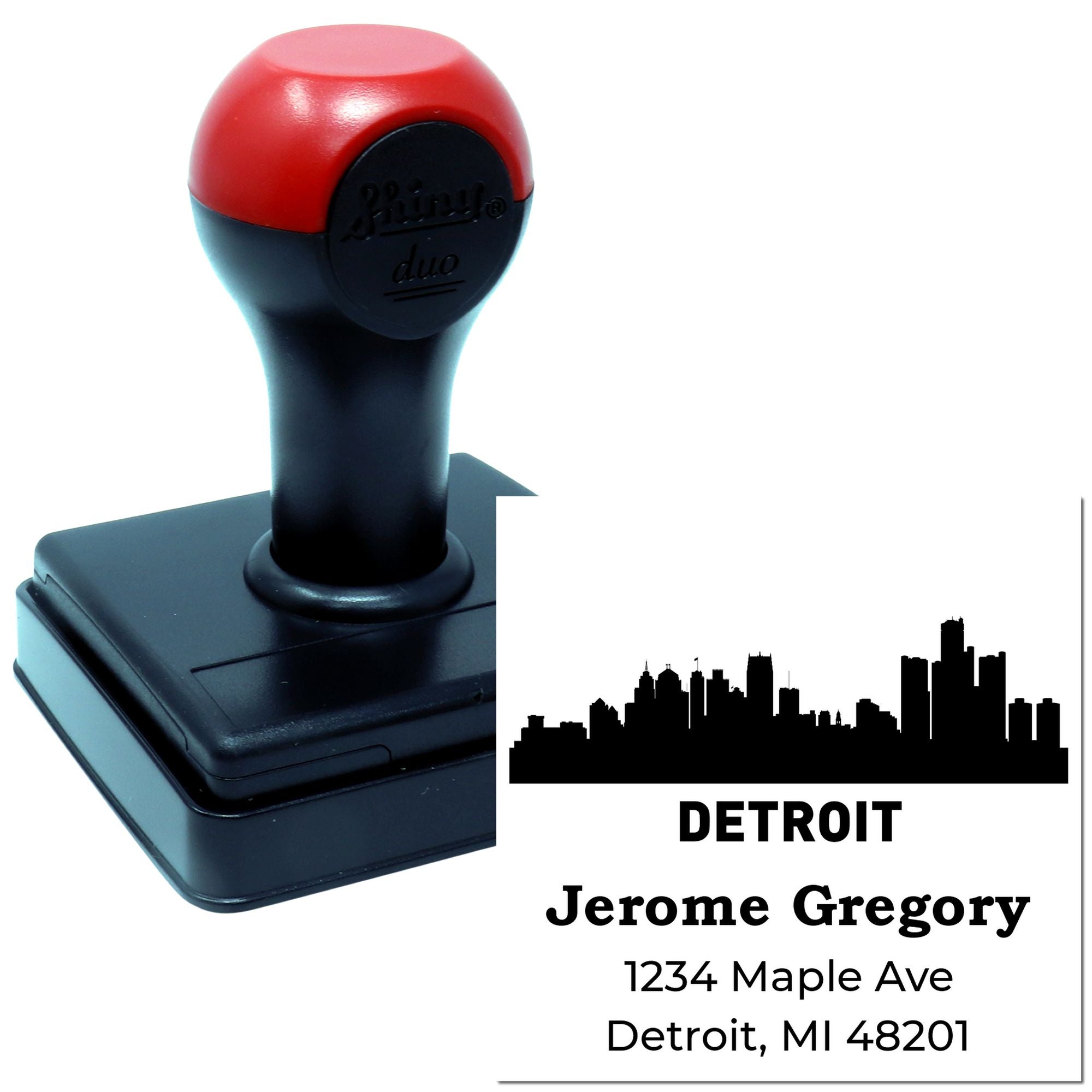Custom self-inking rubber address stamp with Detroit skyline and personalized name and address.