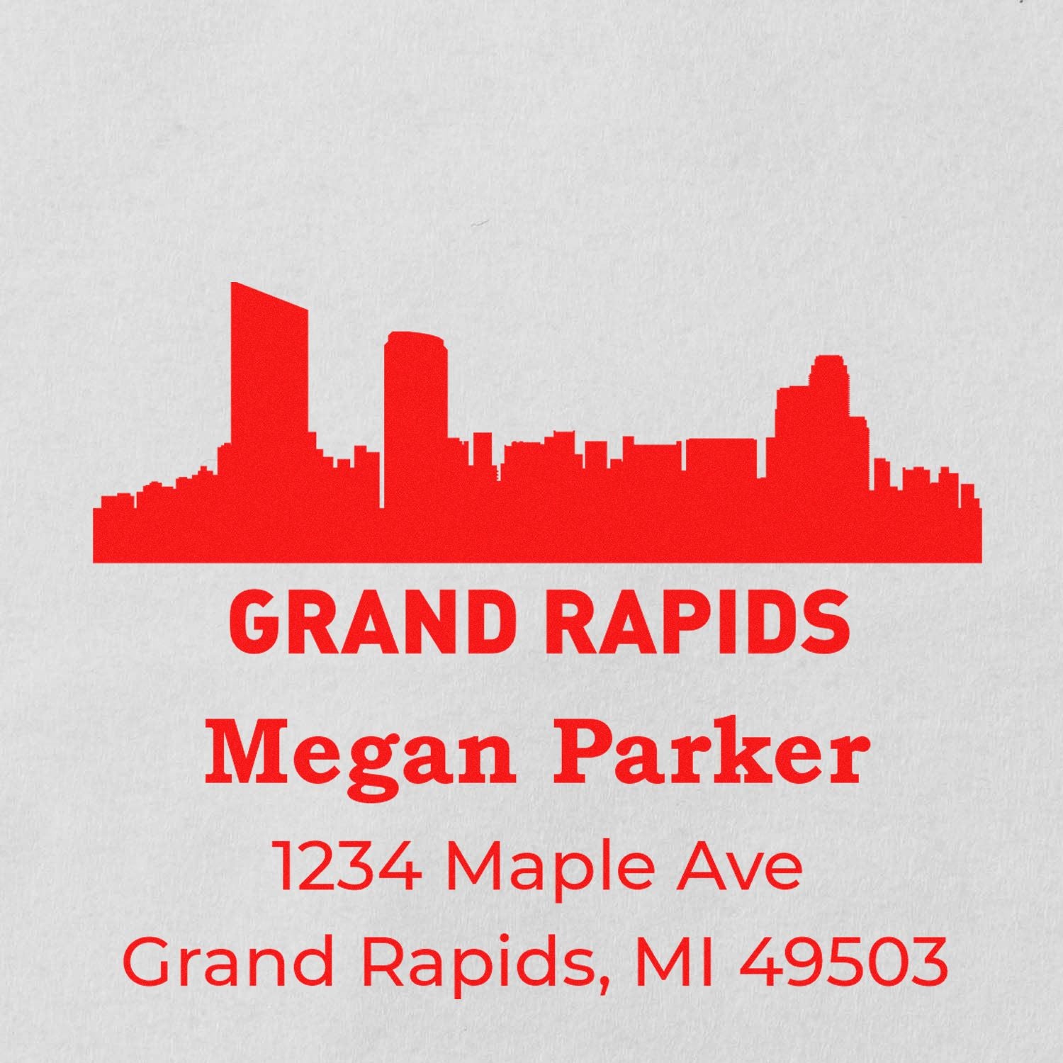 Personalized Grand Rapids rubber address stamp with skyline, Megan Parker, 1234 Maple Ave, Grand Rapids, MI 49503.