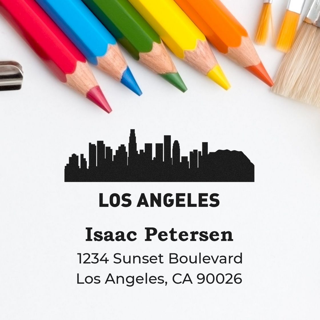 Custom Los Angeles address rubber stamp with skyline, showing Isaac Petersen and 1234 Sunset Boulevard, Los Angeles, CA 90026.