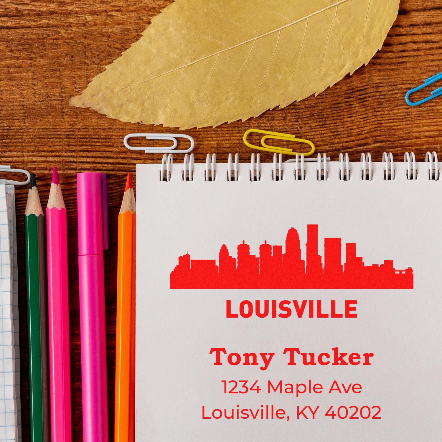 Custom Louisville rubber address stamp for Tony Tucker with skyline design and return address.