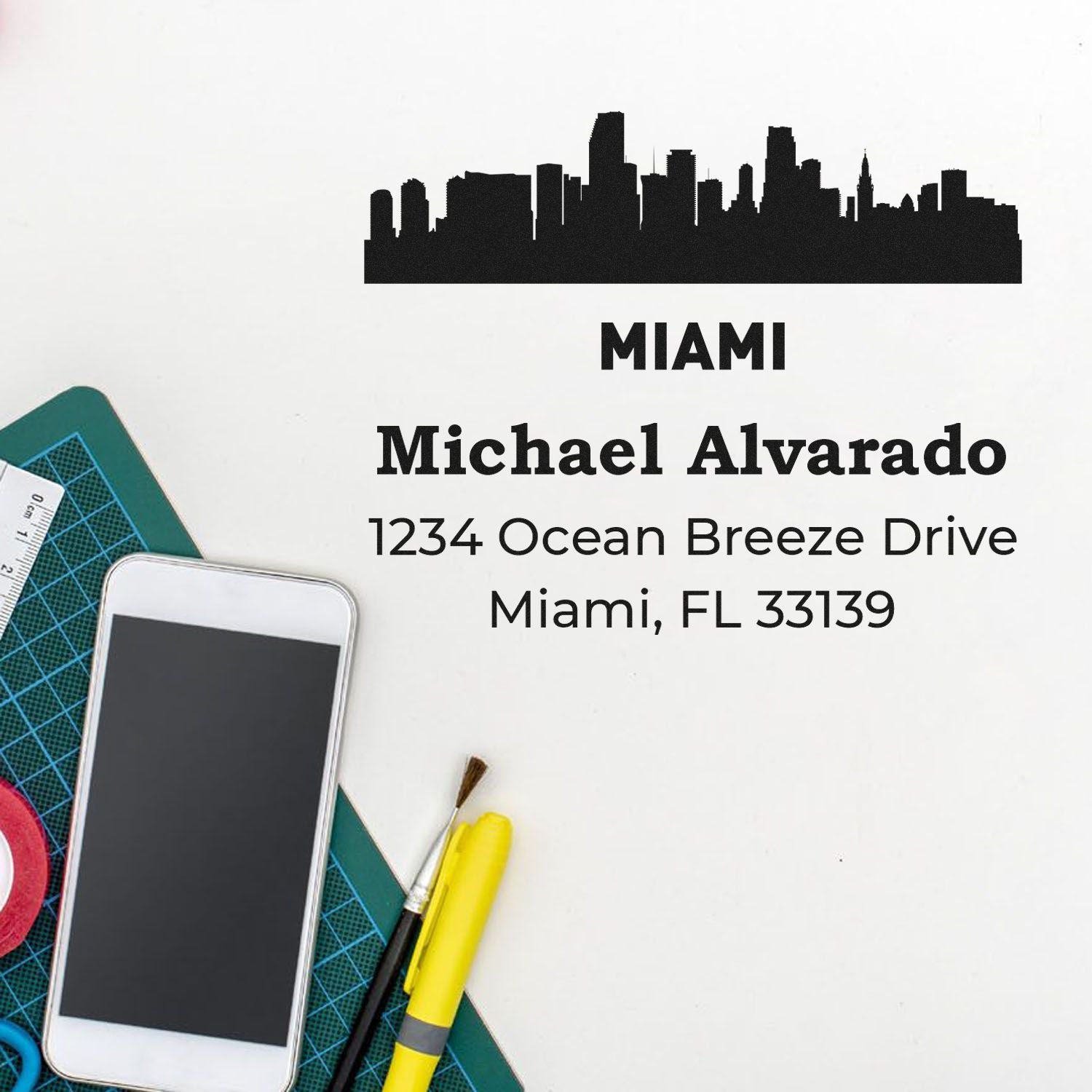 Custom Miami address rubber stamp with skyline, name, and mailing address for personalized stationery and packaging.