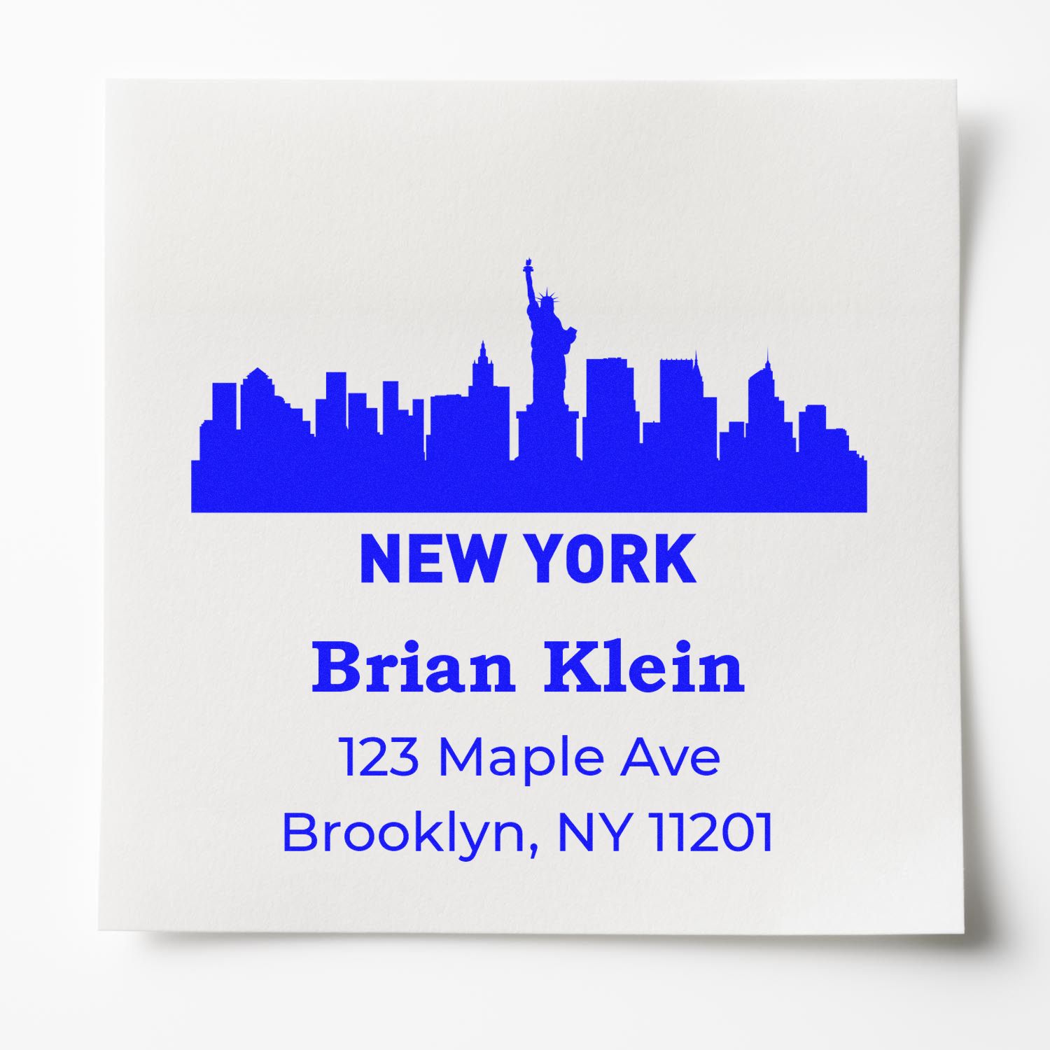 Personalized New York skyline return address rubber stamp for Brian Klein, 123 Maple Ave, Brooklyn, NY 11201.