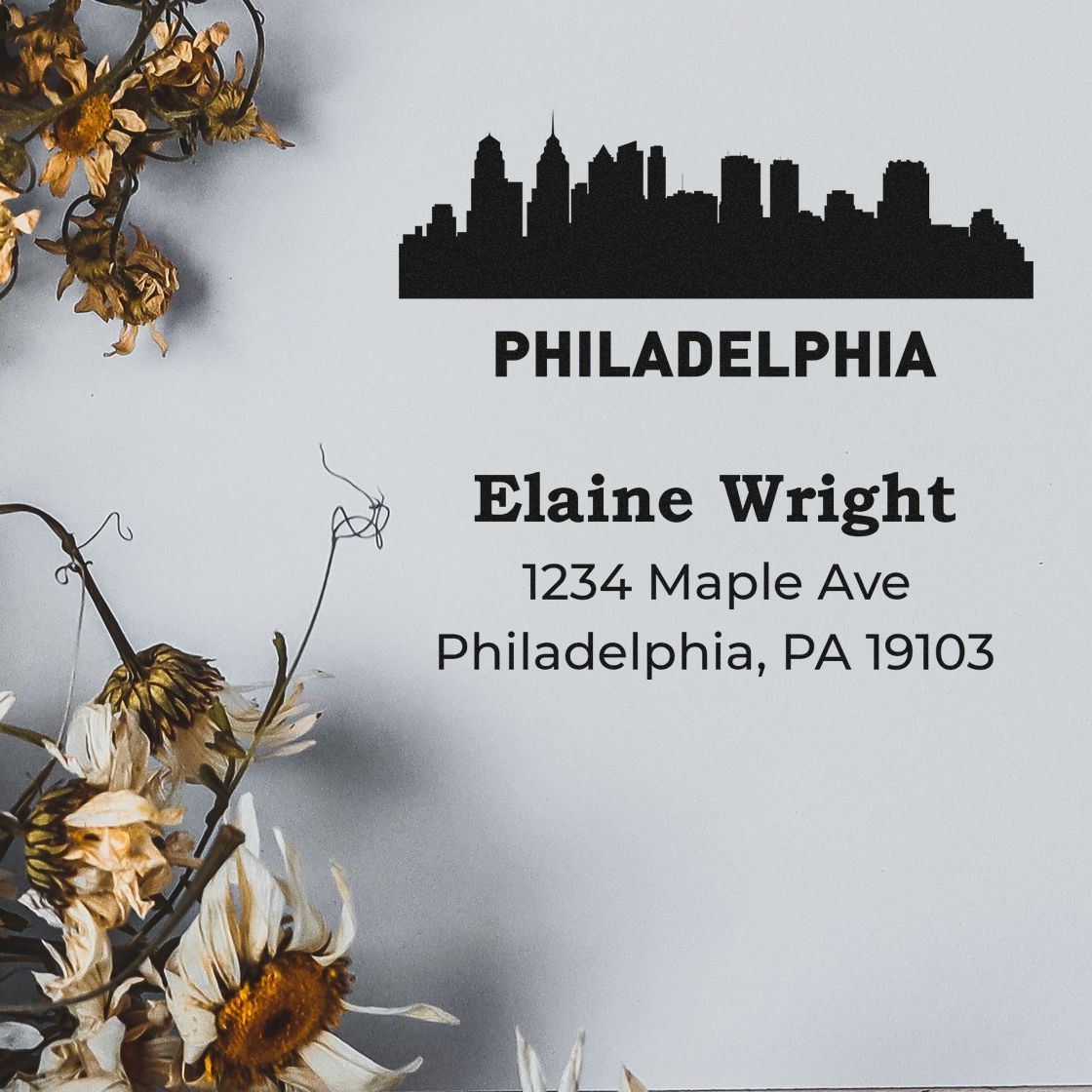 Custom Philadelphia skyline address rubber stamp for Elaine Wright, 1234 Maple Ave, Philadelphia, PA 19103.