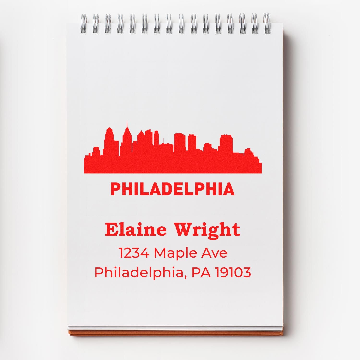 Philadelphia skyline return address rubber stamp with custom name and address for personalized mail and packaging.