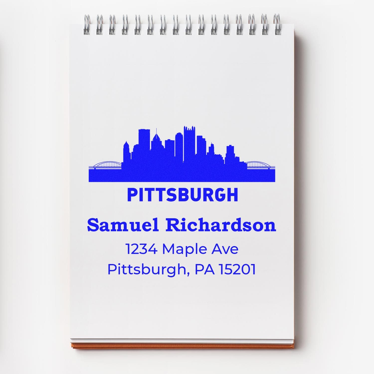 Custom Pittsburgh address rubber stamp with skyline, Samuel Richardson name, and Maple Ave mailing details.