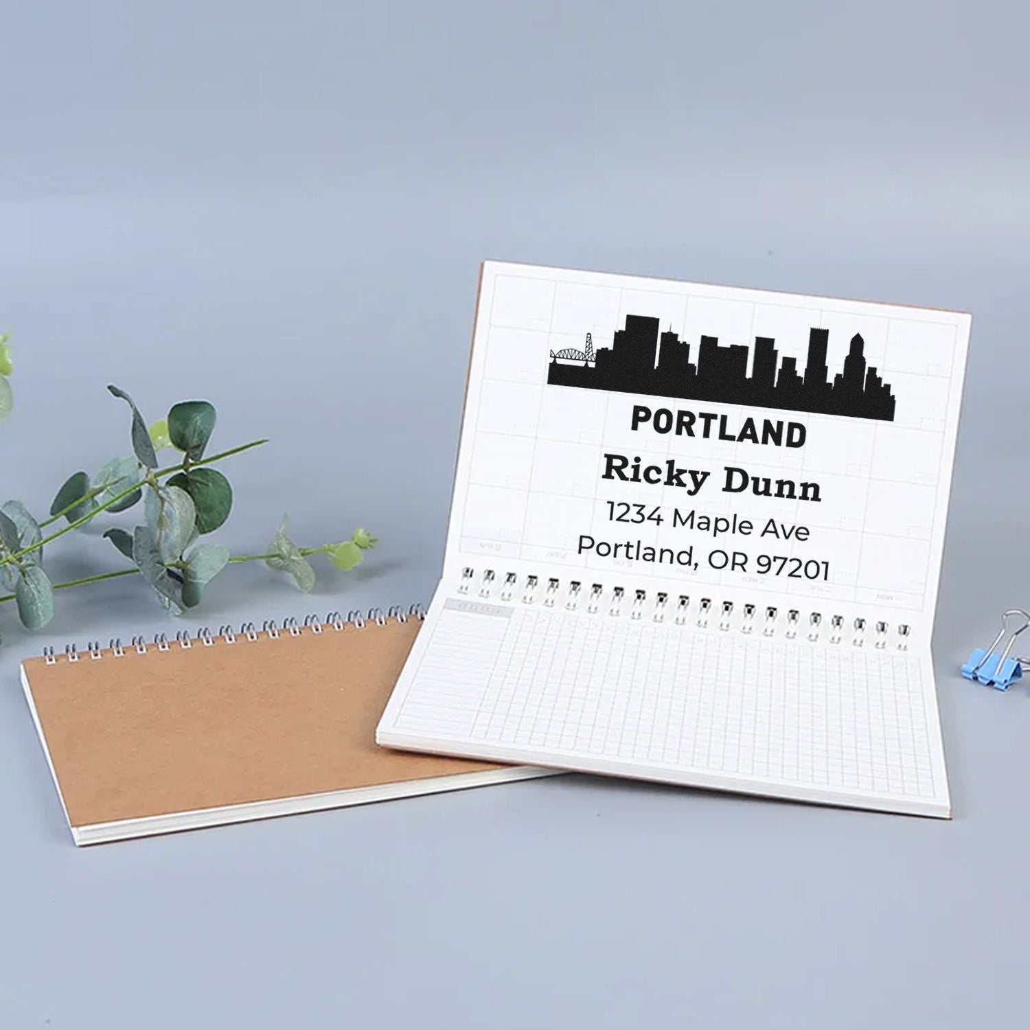 Custom Portland return address rubber stamp with skyline, name, and address for personalized stationery.