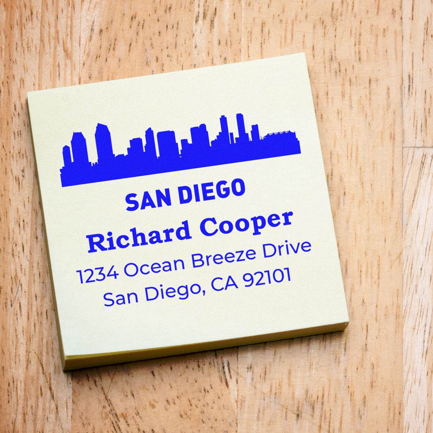 Personalized San Diego return address rubber stamp with skyline design for mailing and packaging.