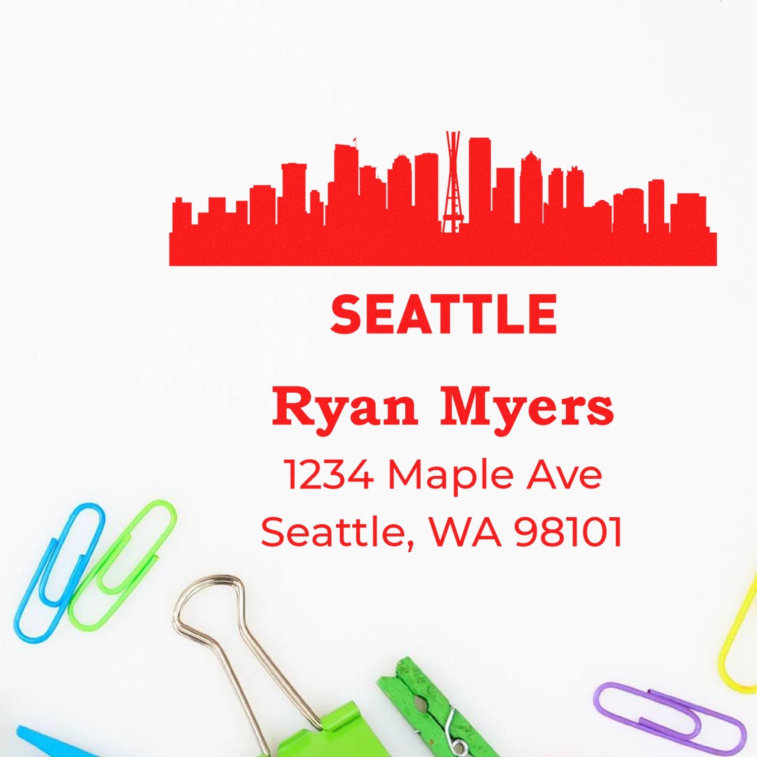 Personalized Seattle skyline rubber stamp for return addresses, featuring Ryan Myers, 1234 Maple Ave, Seattle, WA 98101.