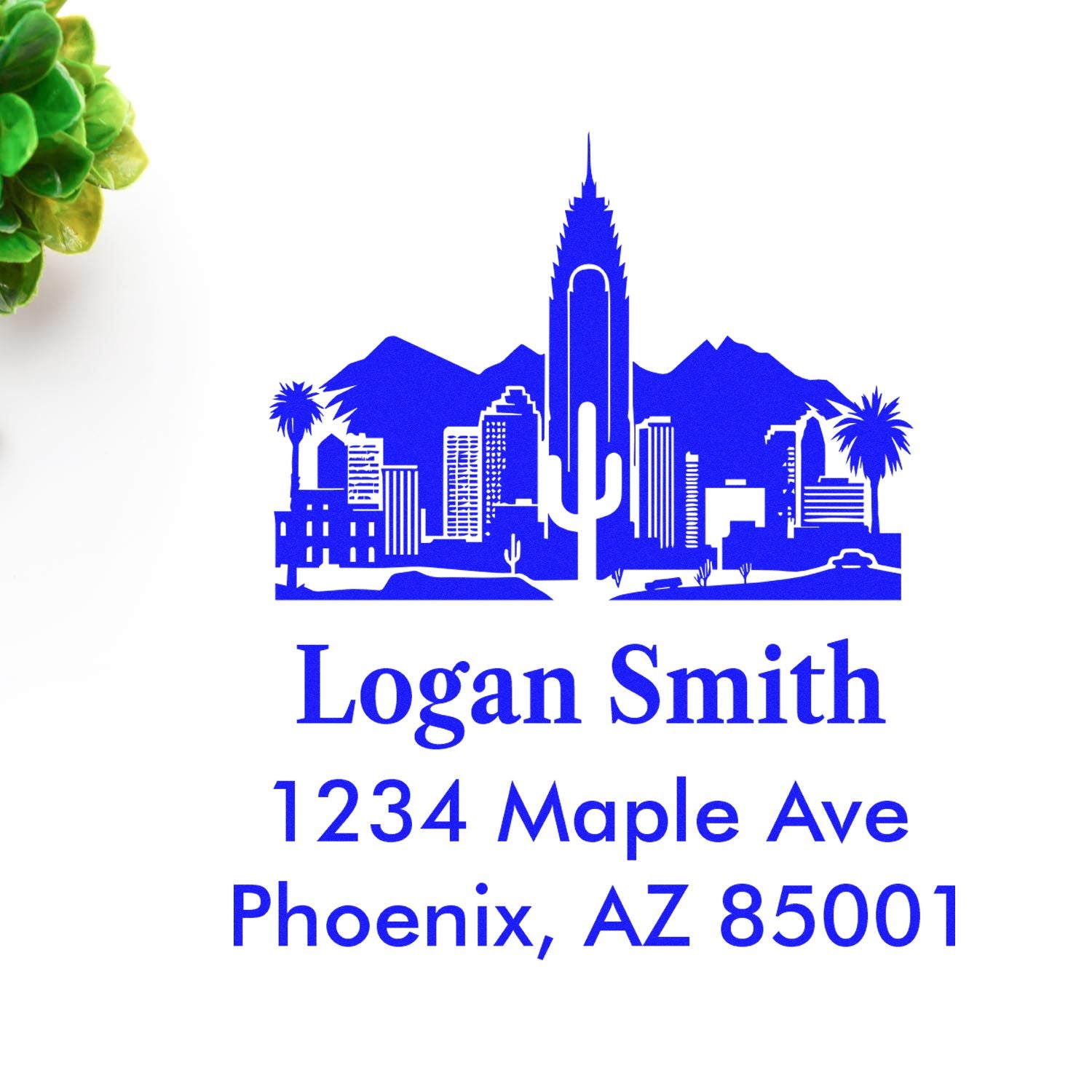 Custom Phoenix address rubber stamp with skyline and cactus, featuring Logan Smith, 1234 Maple Ave, Phoenix, AZ 85001.
